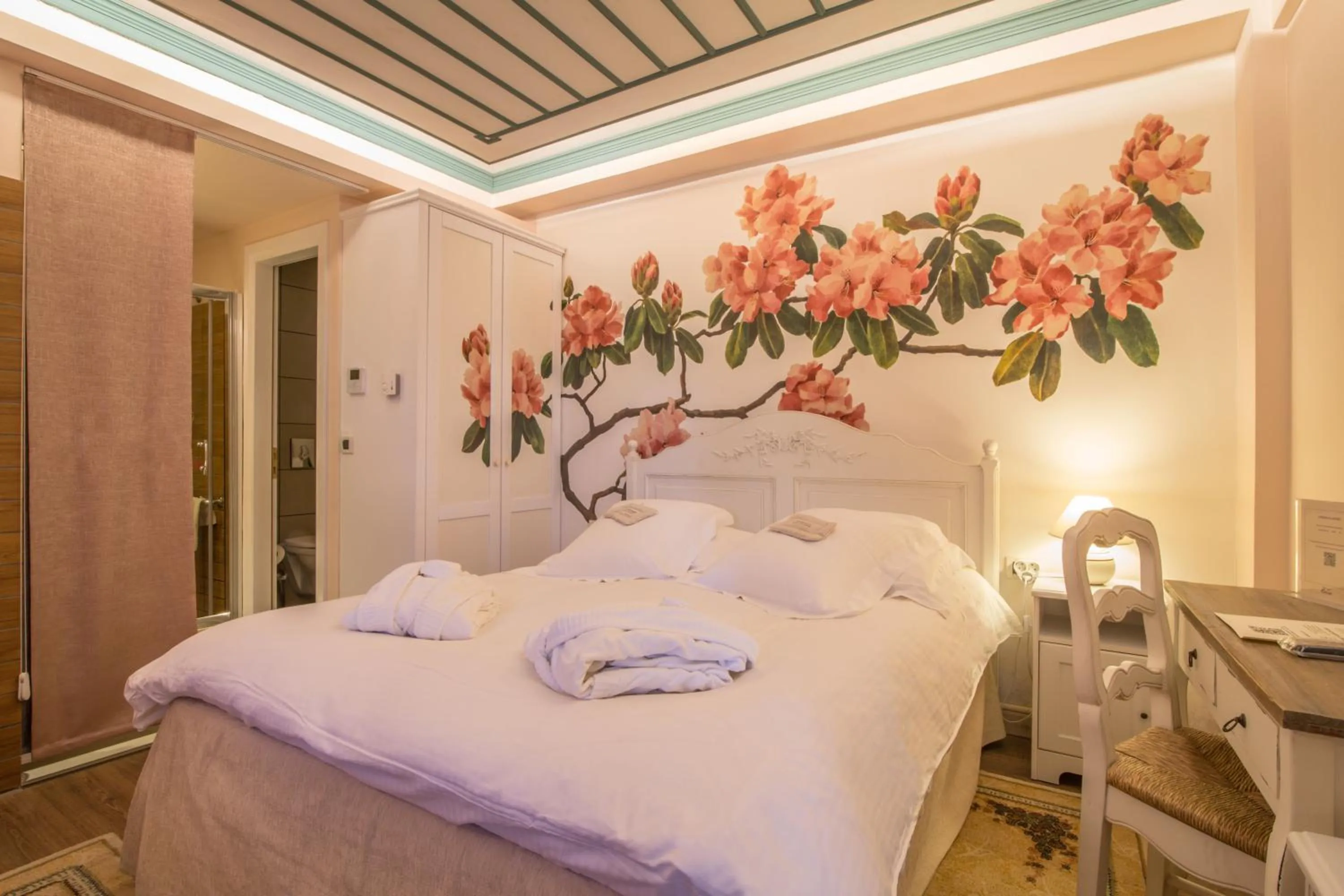 Bed in Pirrion Wellness Boutique Hotel