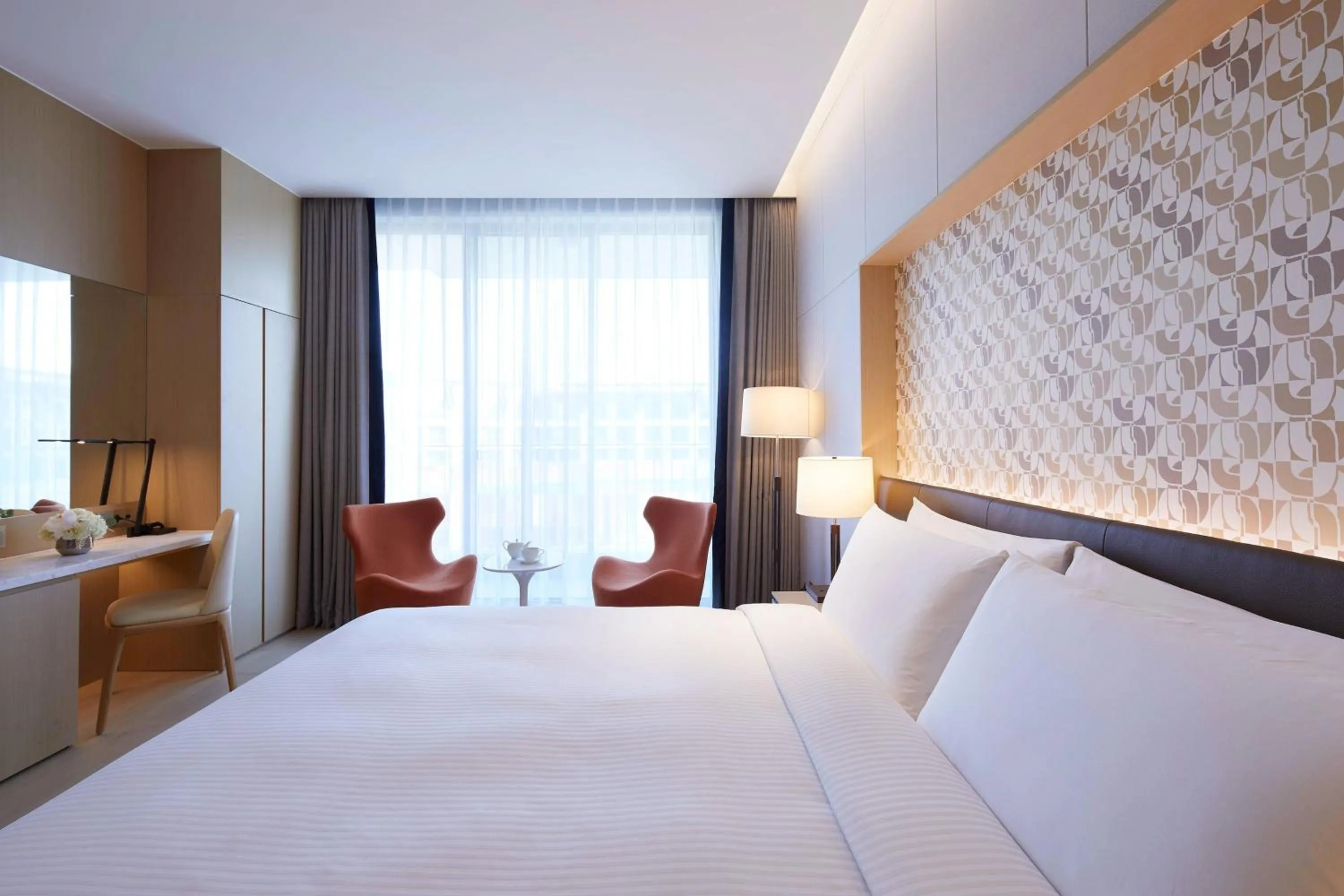 Photo of the whole room, Bed in Marriott Jeju Shinhwa World Hotel