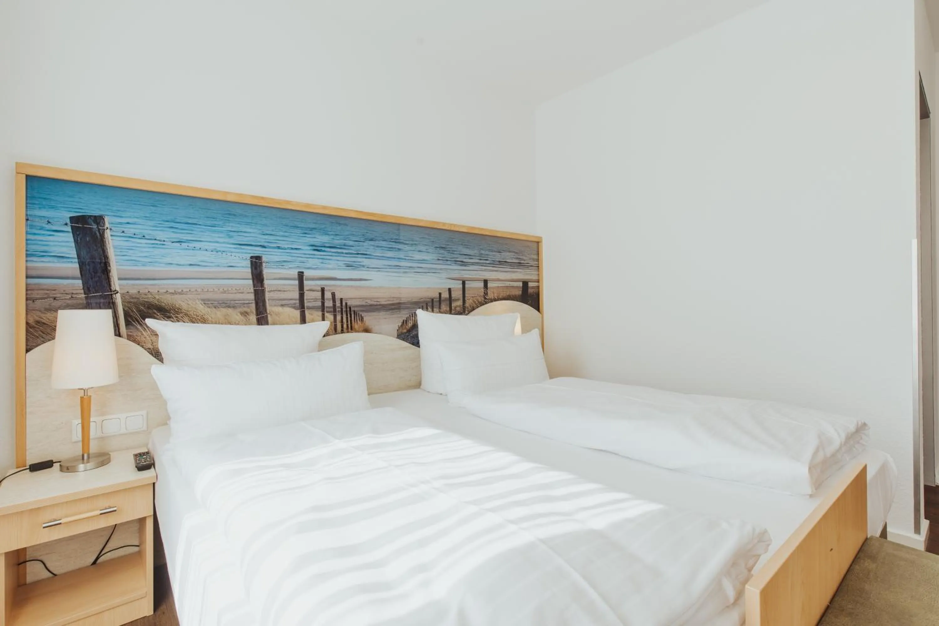 Bed in Parkhotel IV Jahreszeiten Kühlungsborn