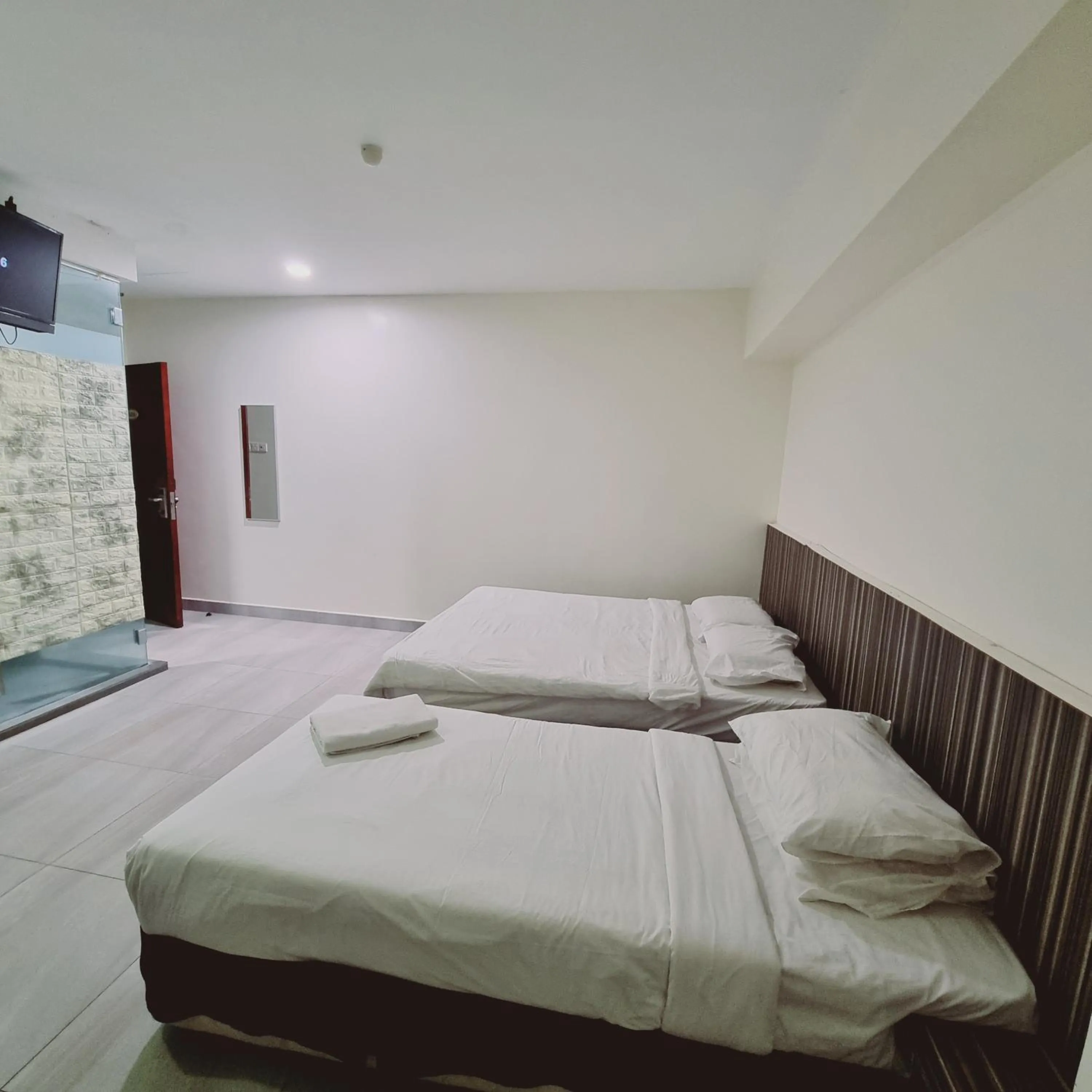 Bed in Sunrise Golden Hotel