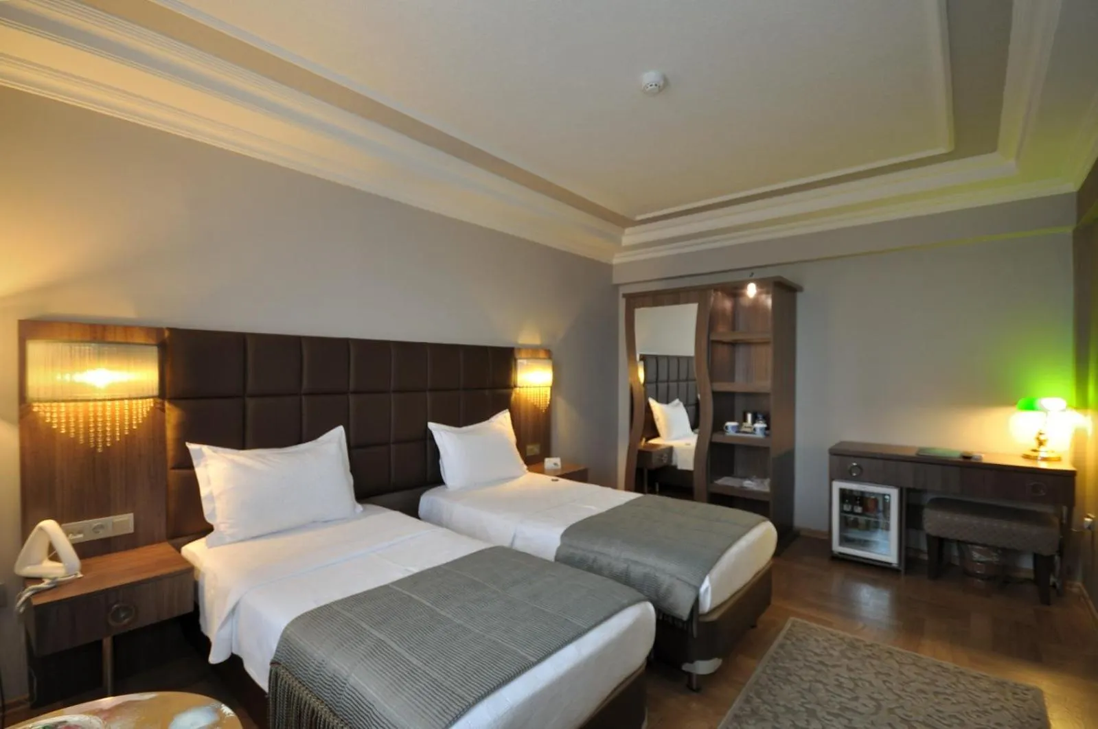 Communal lounge/ TV room, Bed in Grand Atakum Hotel