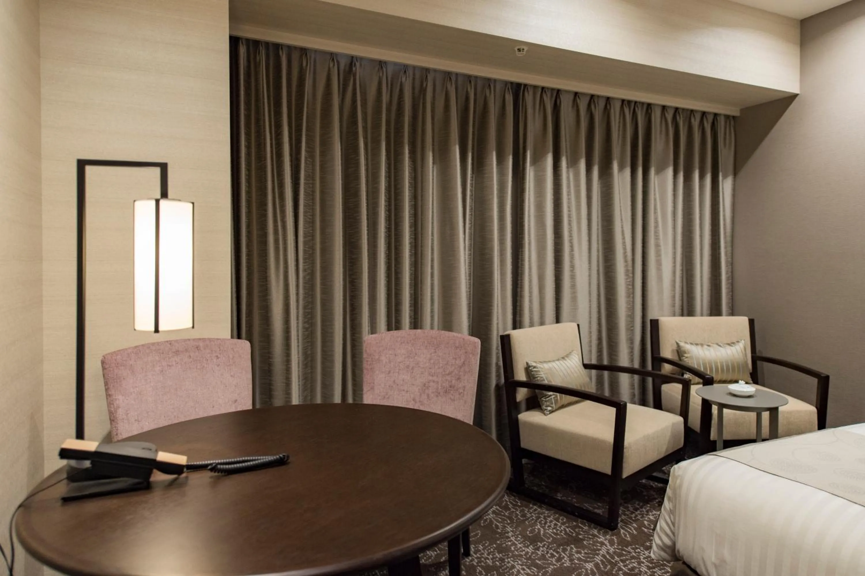 Seating area, Bed in Hotel Ole