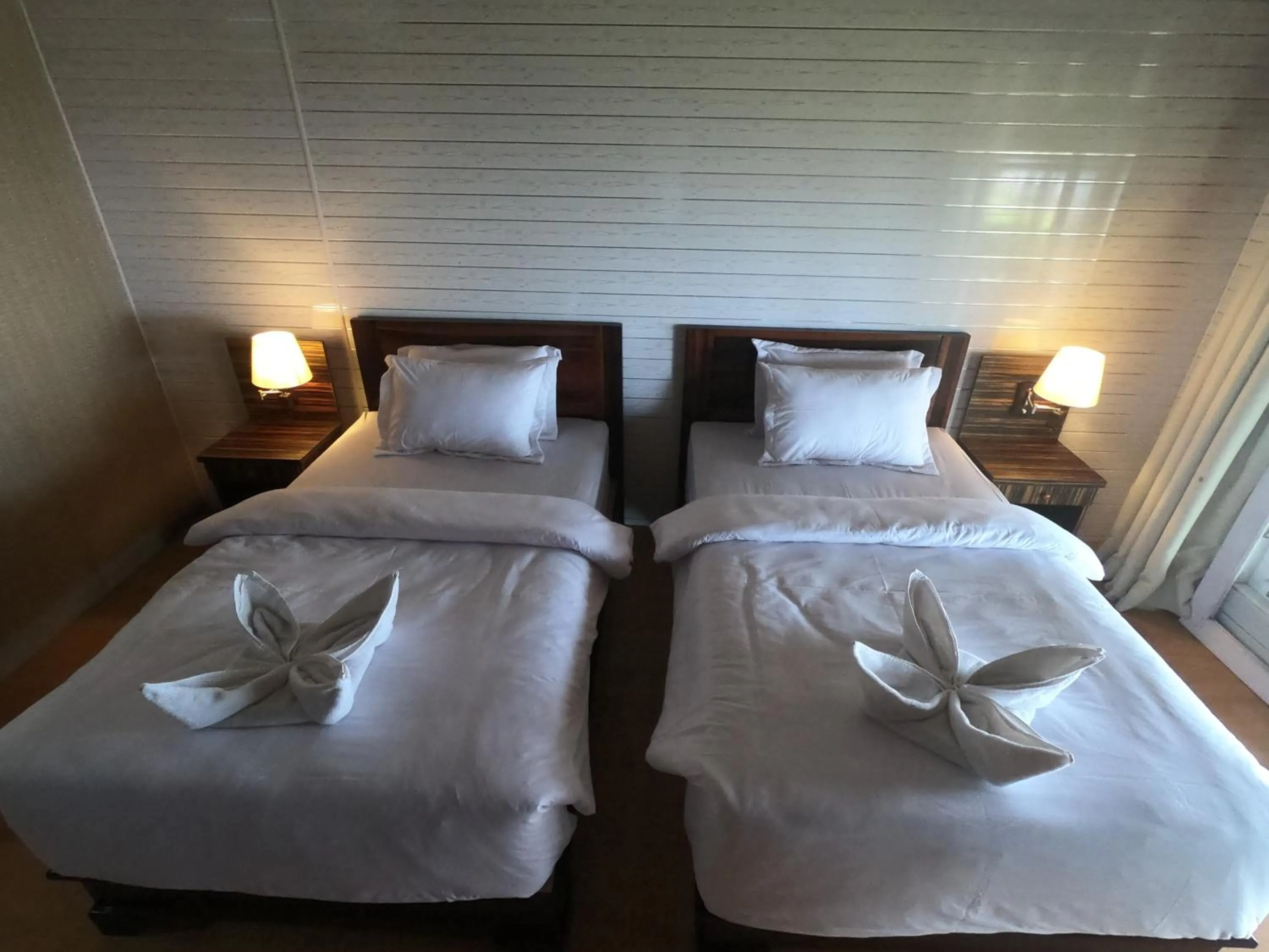 Bed in BatuRundung Surf Resort