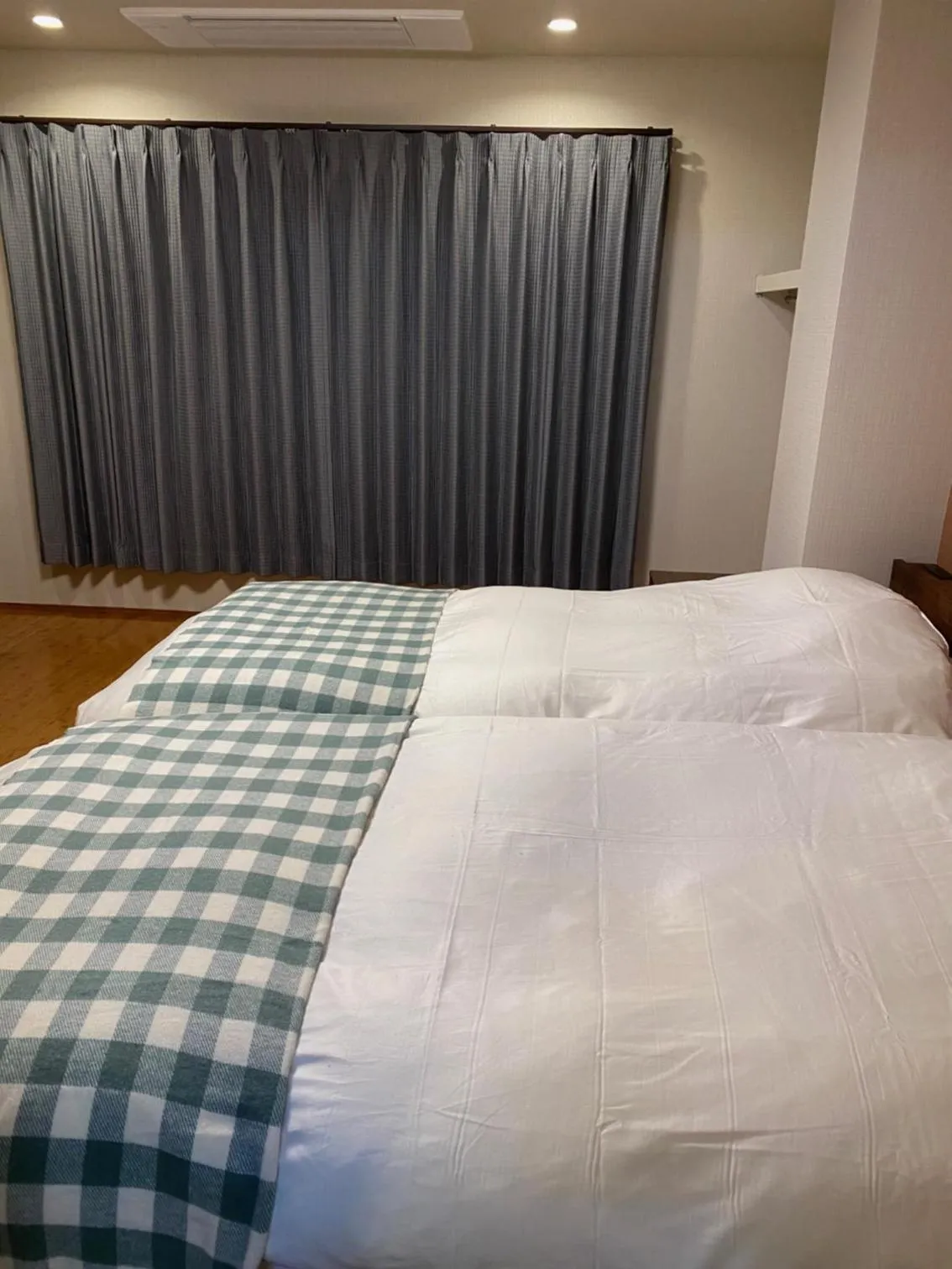 Bed in The Address Akakura
