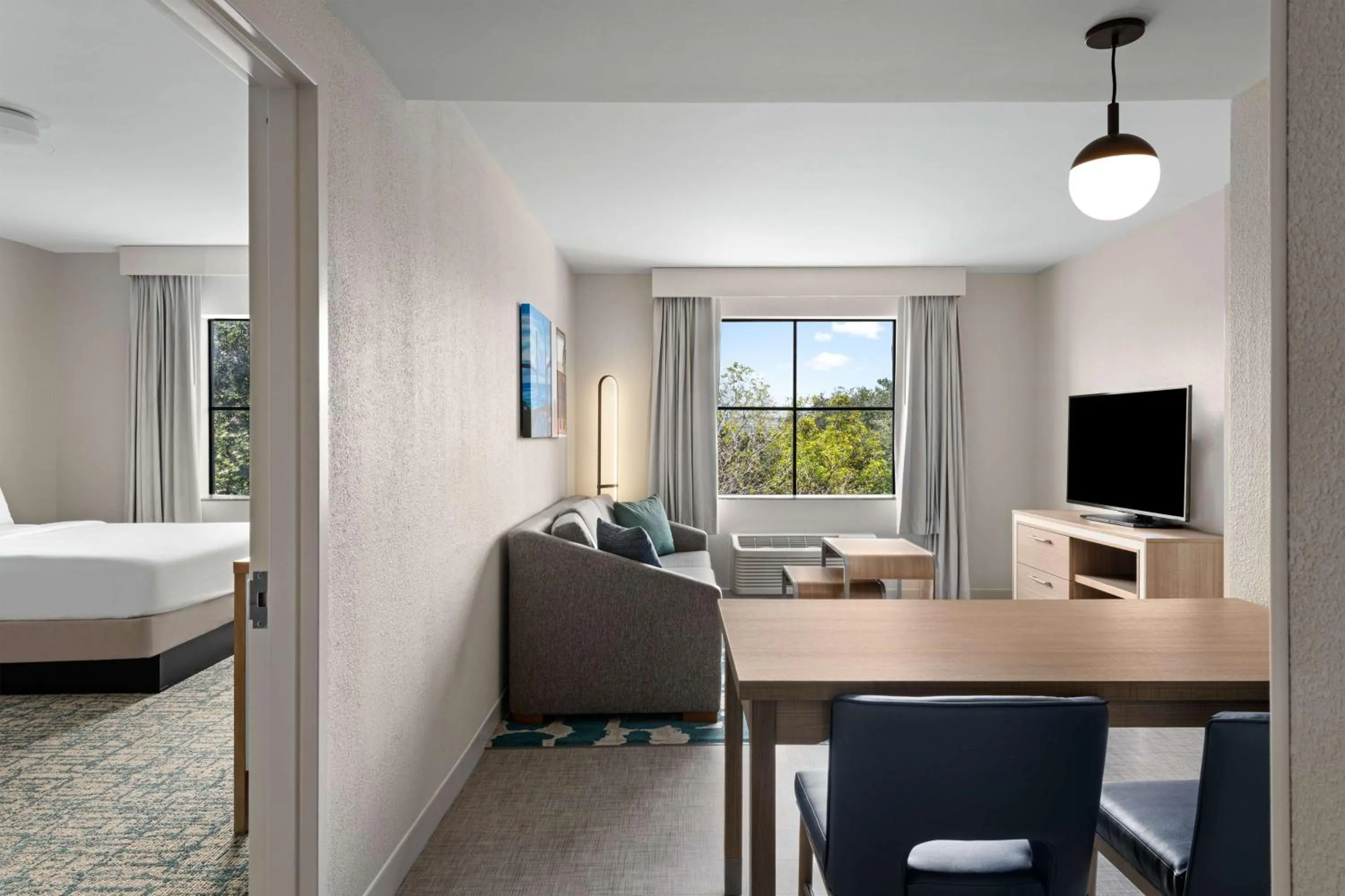 Living room, Bed in Homewood Suites by Hilton West Palm Beach