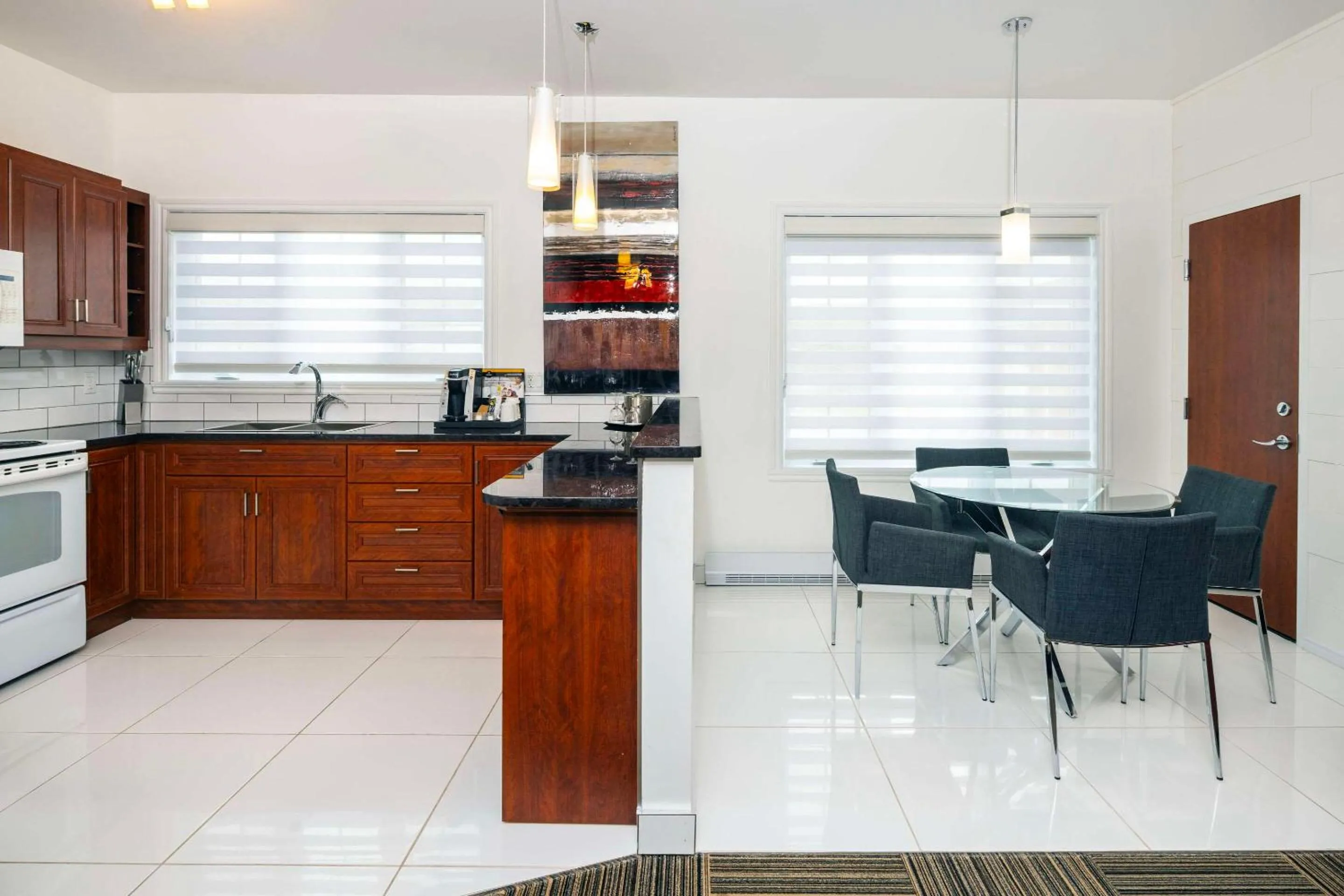 Bedroom in Les Suites de Laviolette, an Ascend Collection Hotel