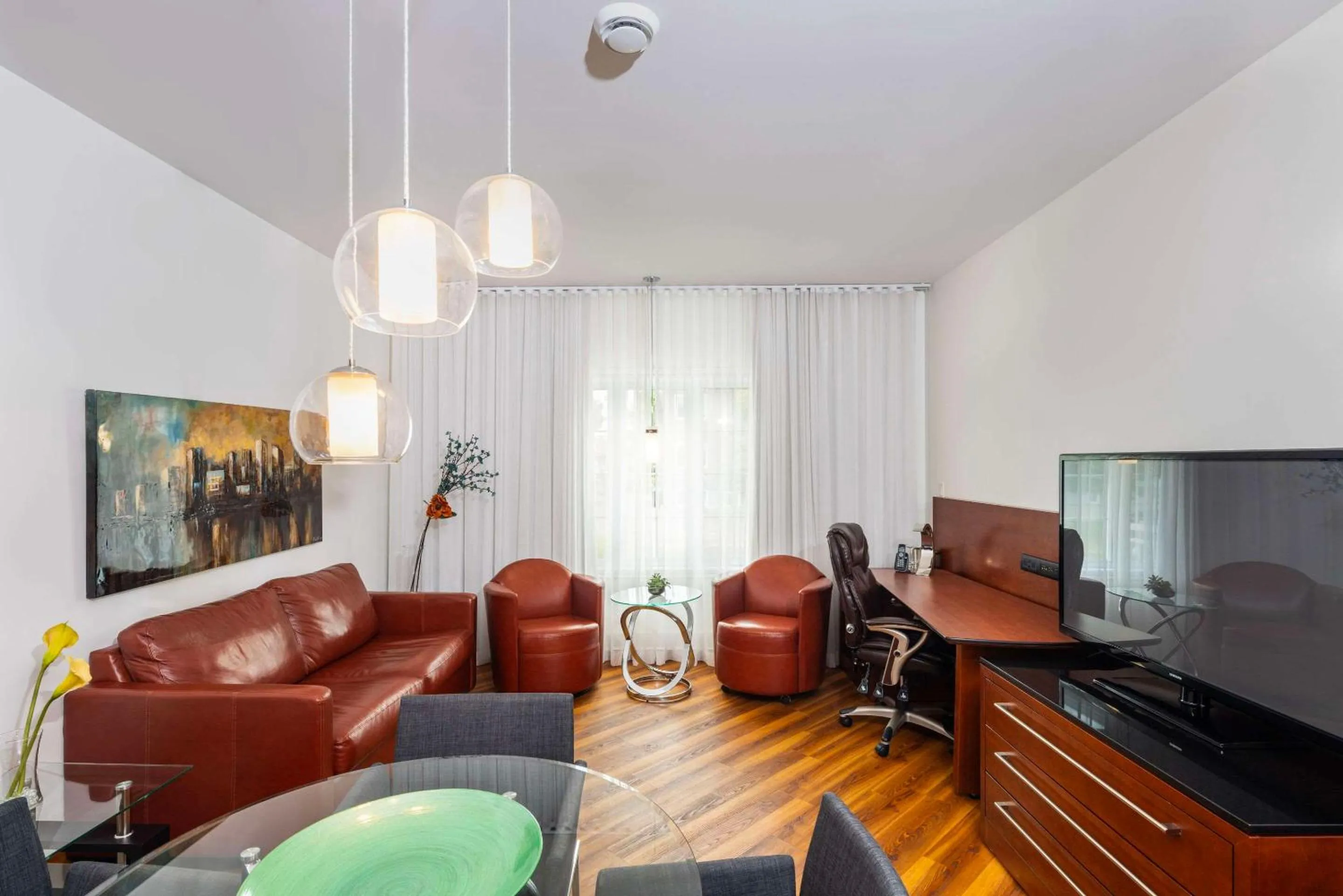 Bedroom in Les Suites de Laviolette, an Ascend Collection Hotel