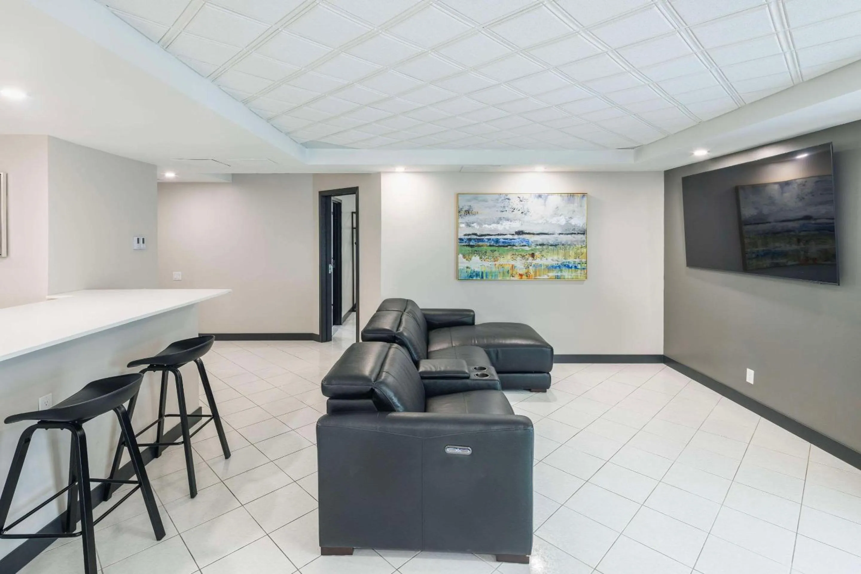 Bedroom in Les Suites de Laviolette, an Ascend Collection Hotel