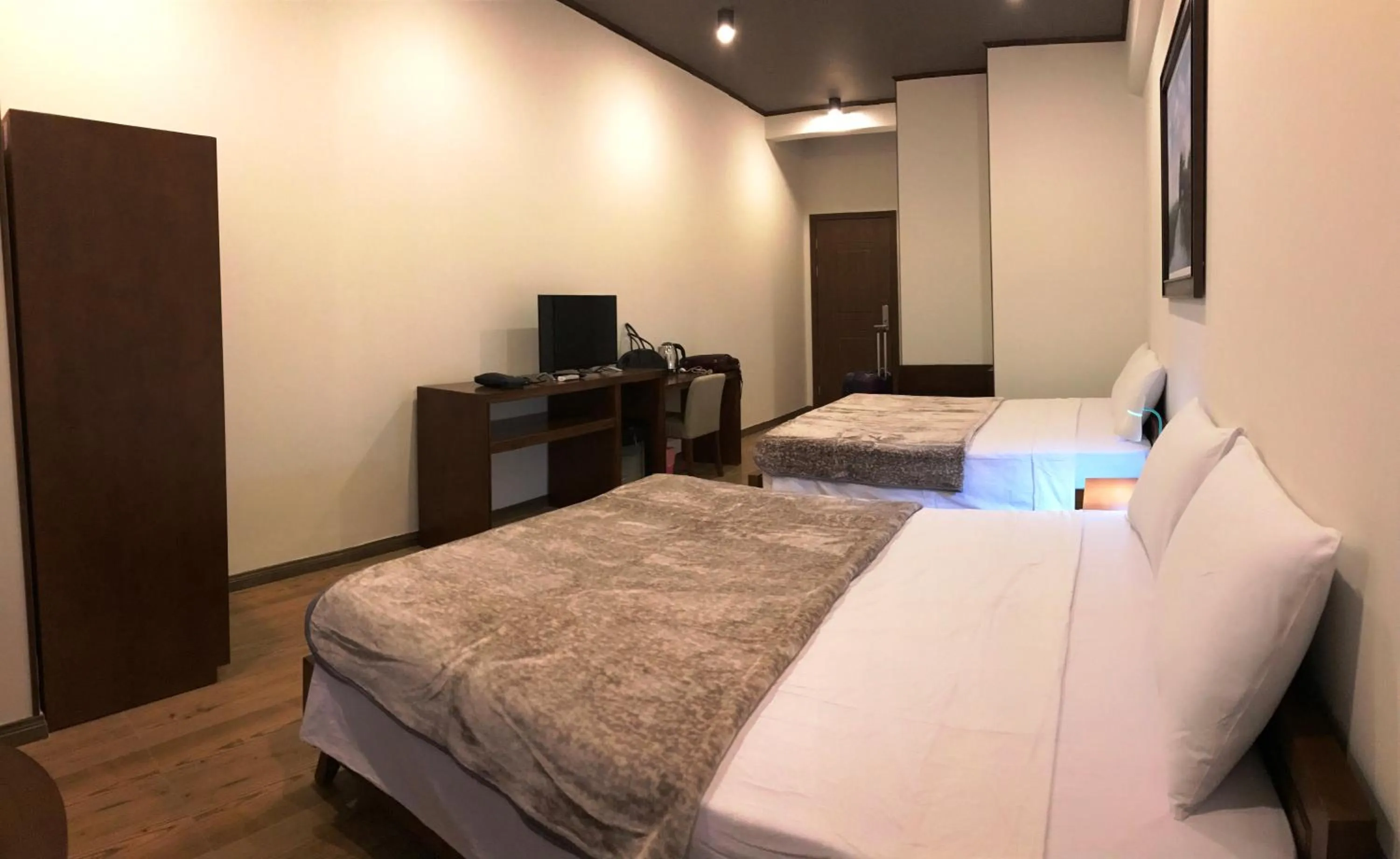 Bed in Oceanward Hotel & Resort