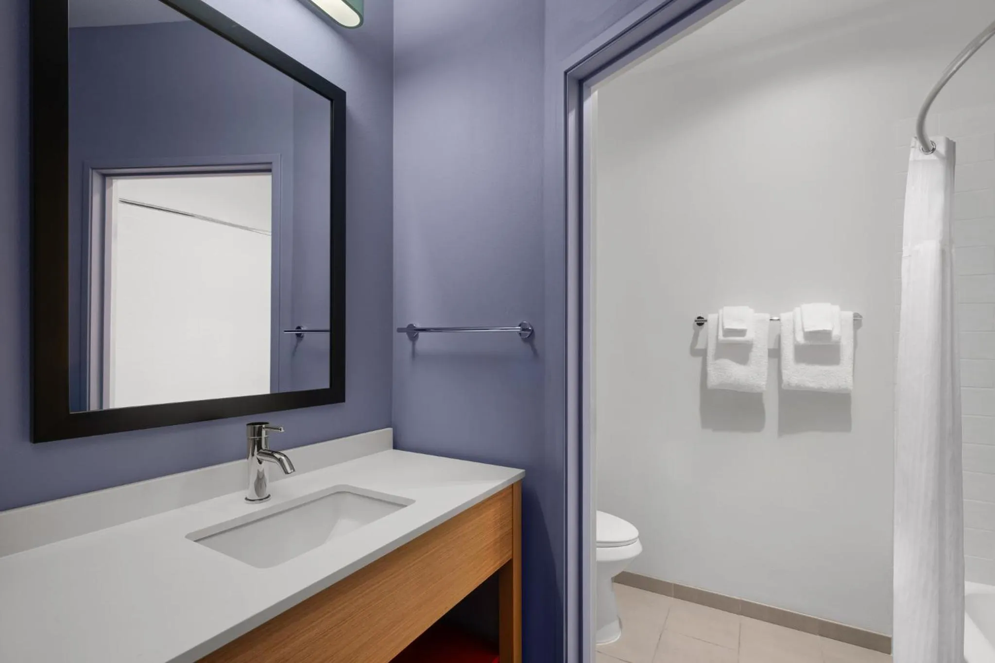 Bathroom in Garner Hotel Liberty Lake by IHG