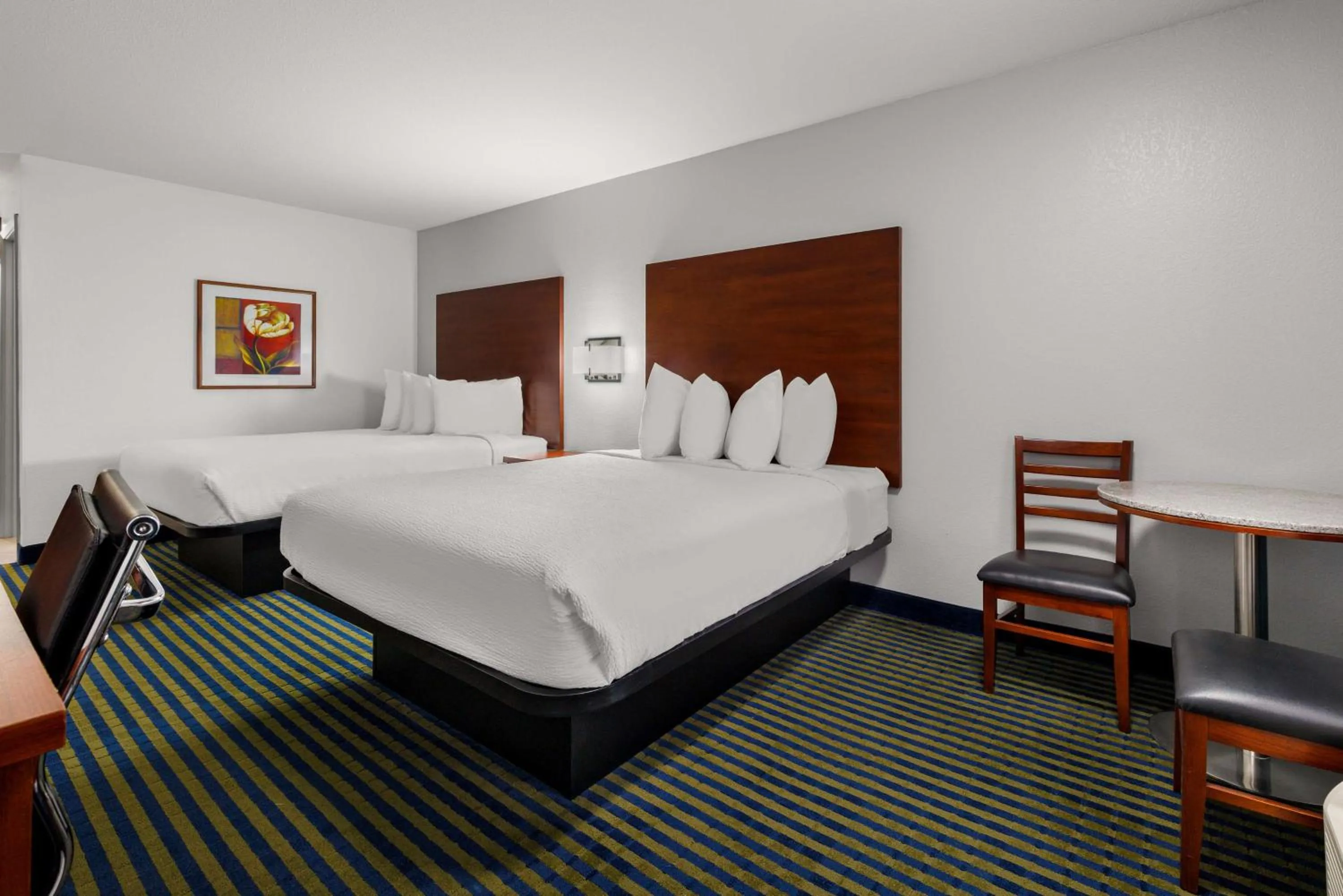 Bed in SureStay Plus by Best Western Brooks