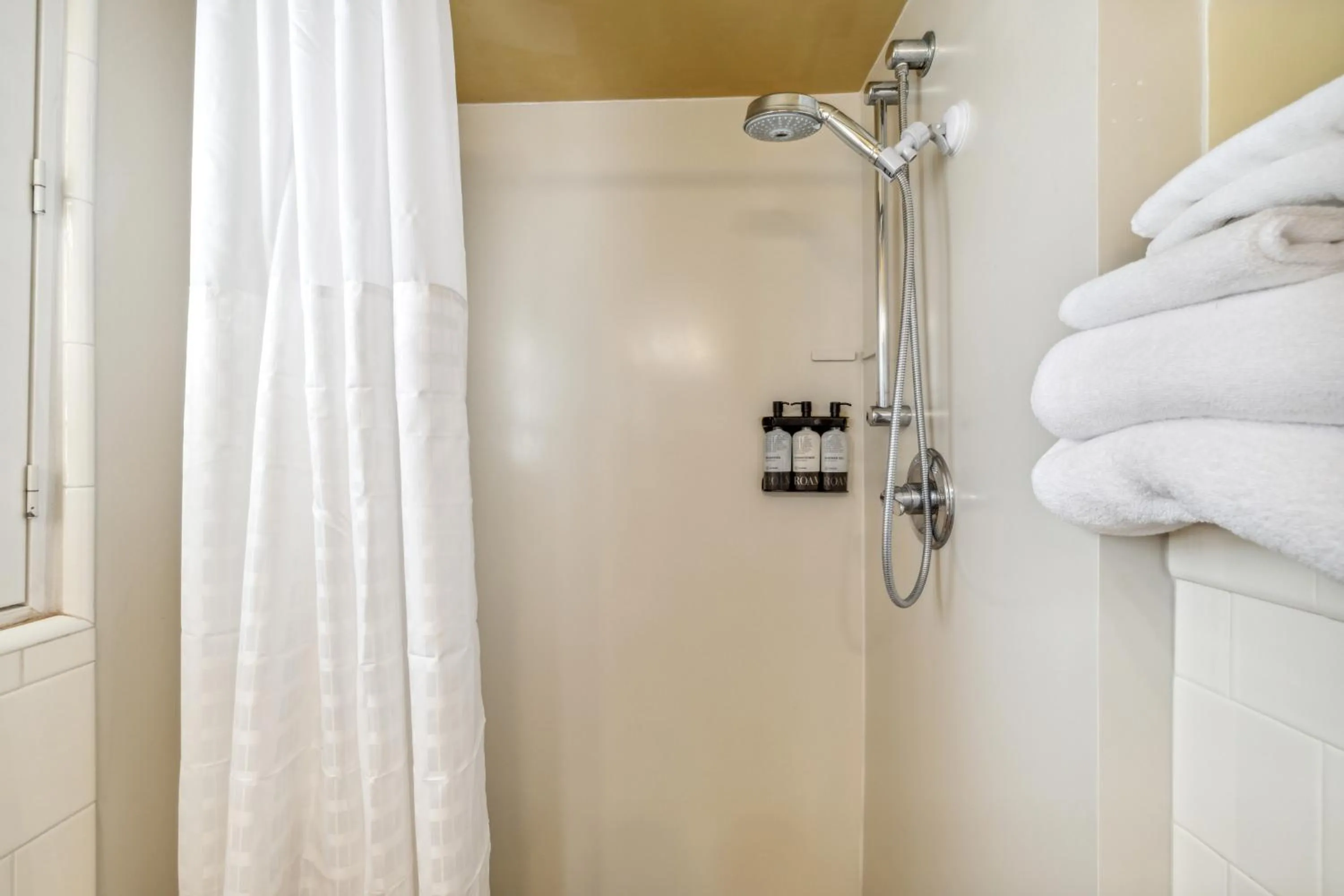 Shower in Inn Marin and Suites, an Ascend Collection Hotel