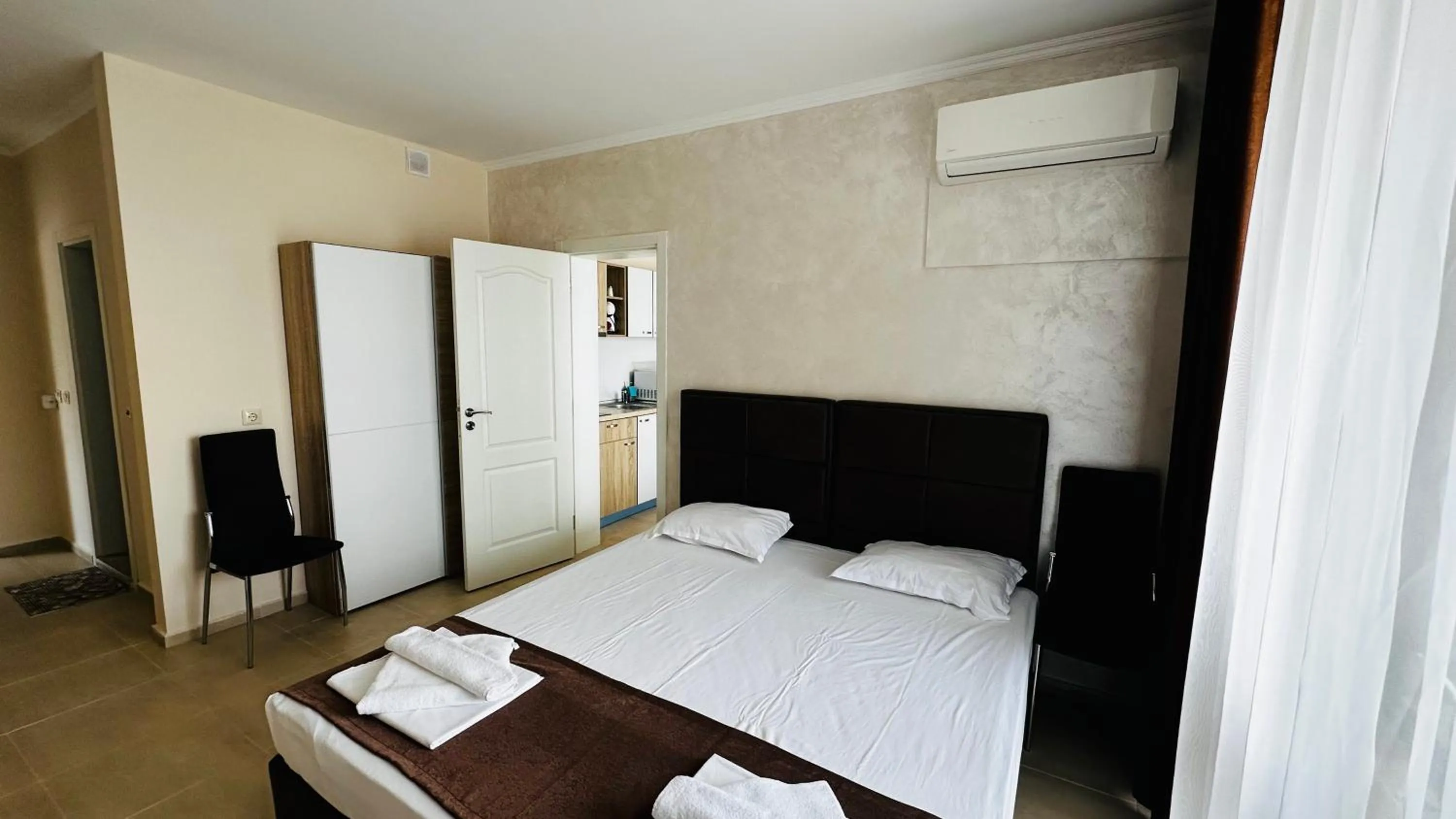 Bed in Akrotiria Beach Apart Complex