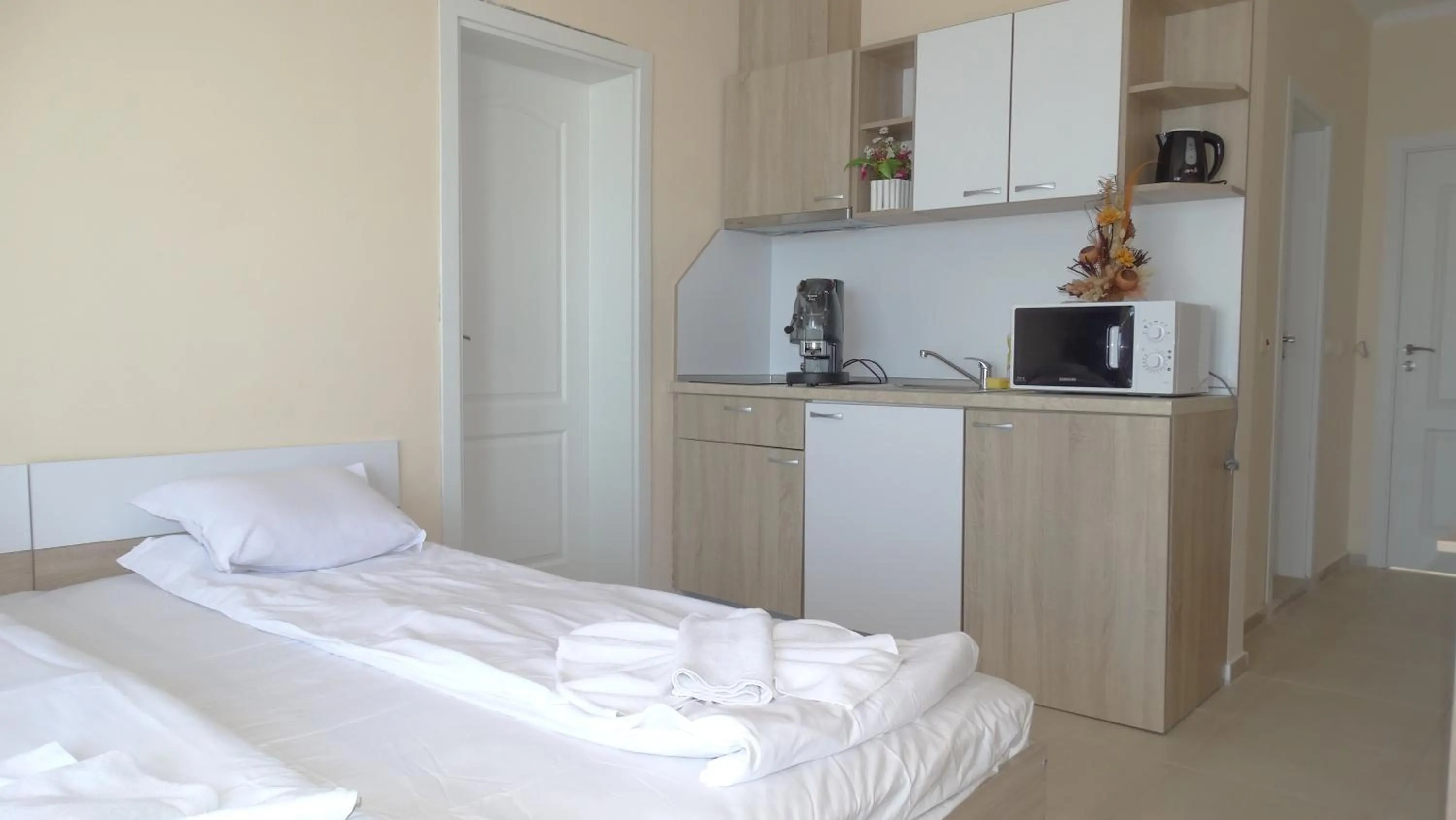 Bed in Akrotiria Beach Apart Complex