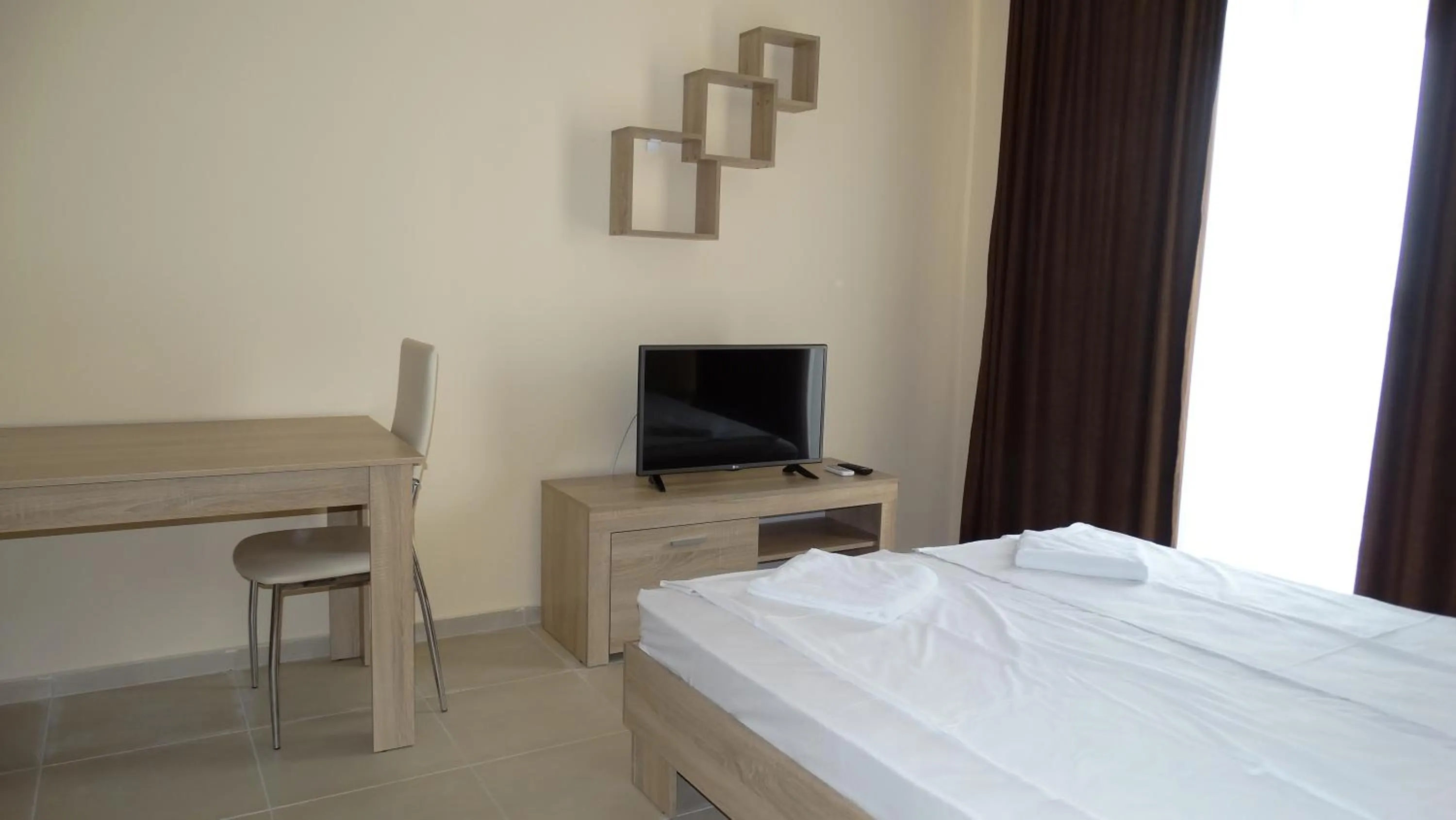 Bed in Akrotiria Beach Apart Complex