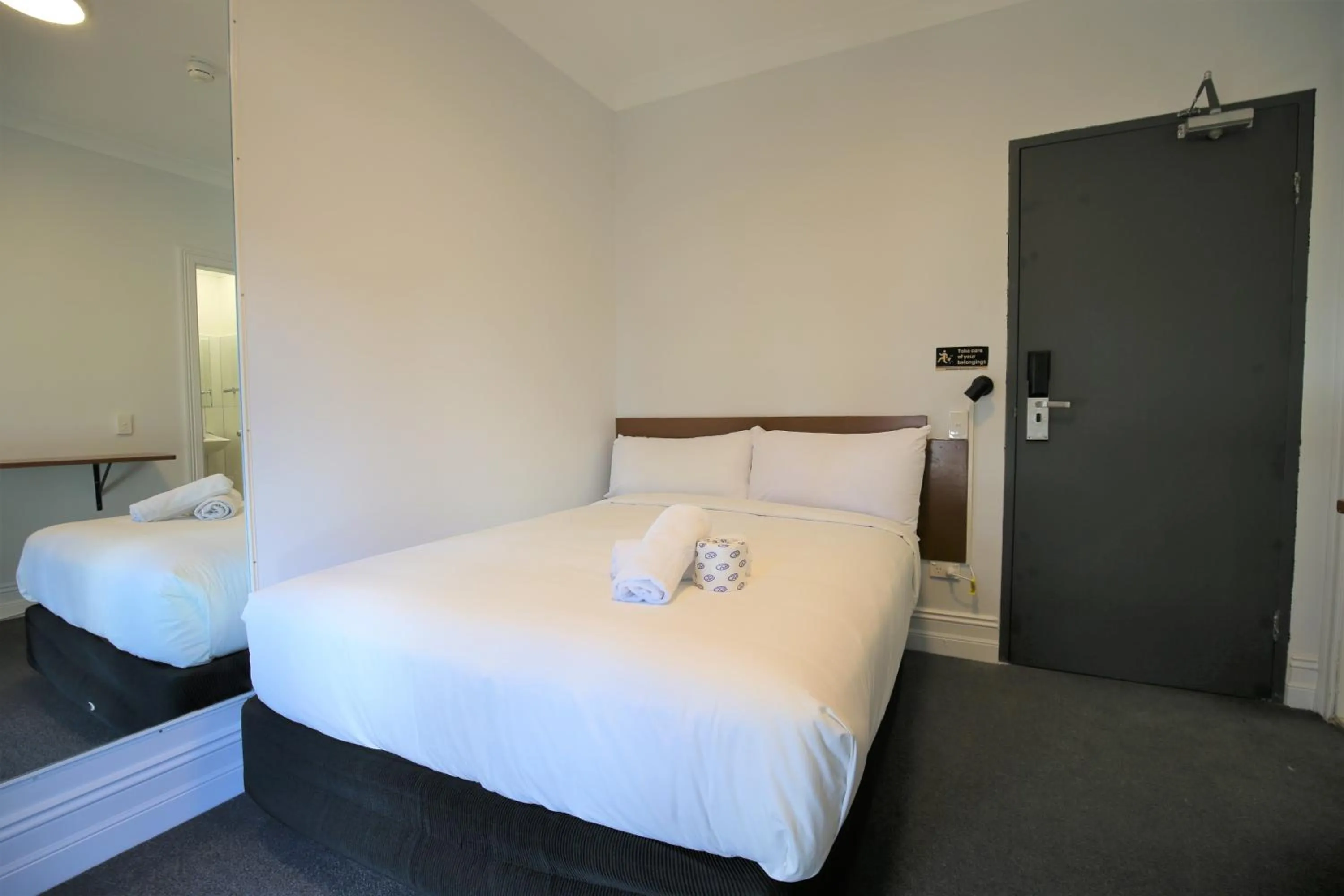 Bed in Newtown Cozy Stays