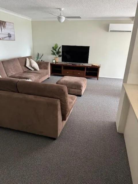 Living room in Pacific Regis Beachfront Holiday Apartments