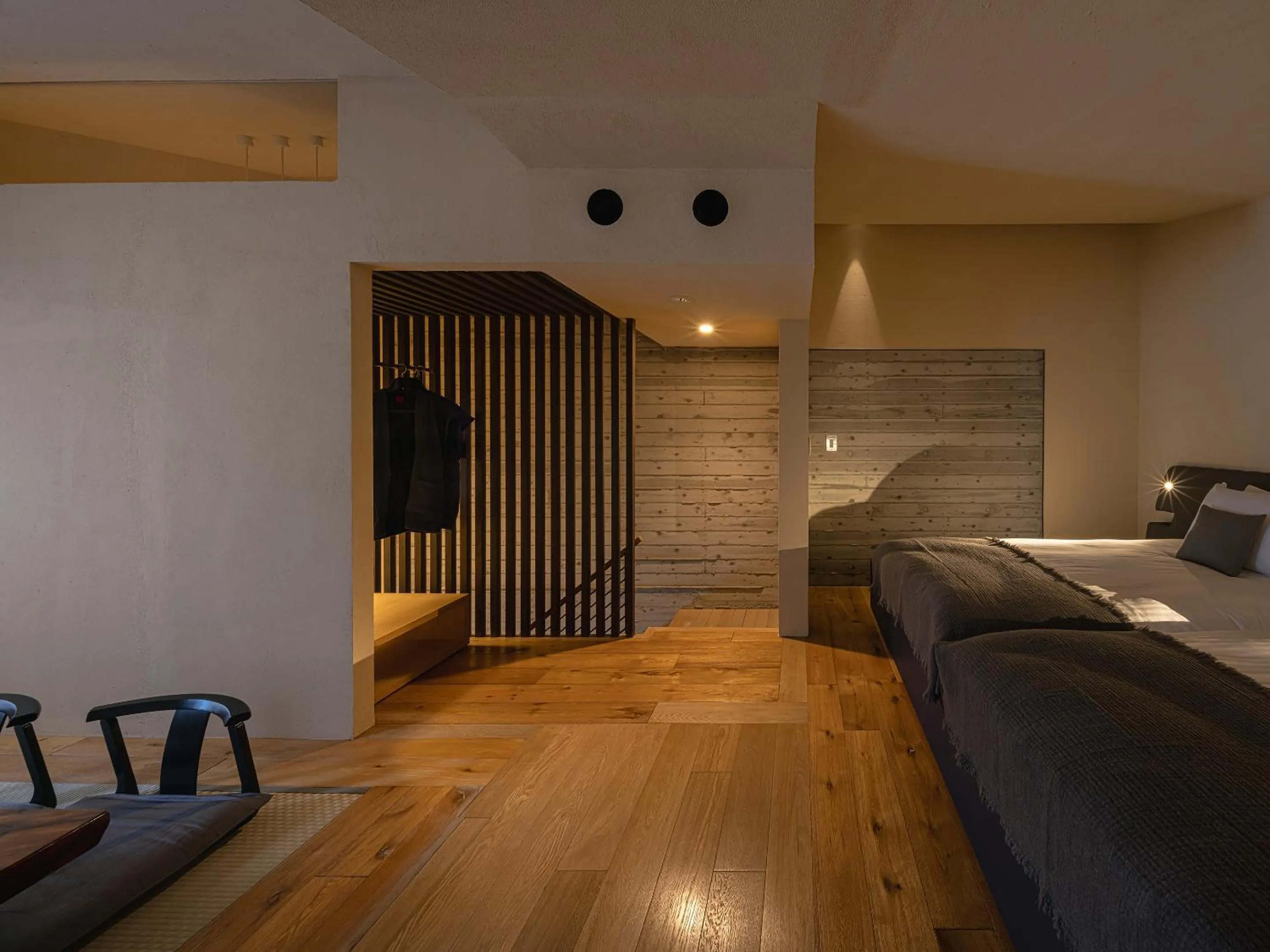 Bed in OTARU RETREAT by Onko Chishin