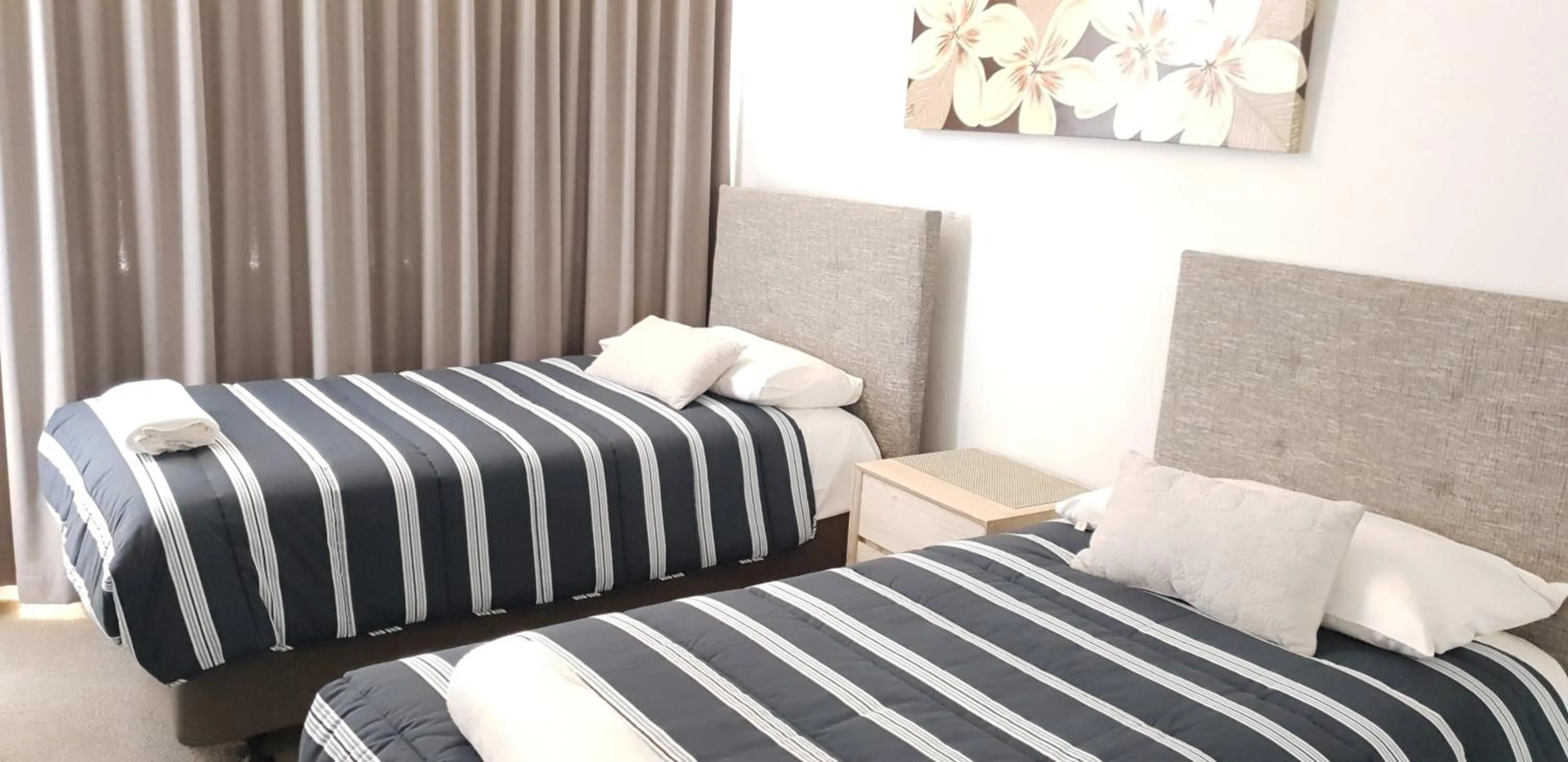 Bed in Wyuna Beachfront Holiday Apartments