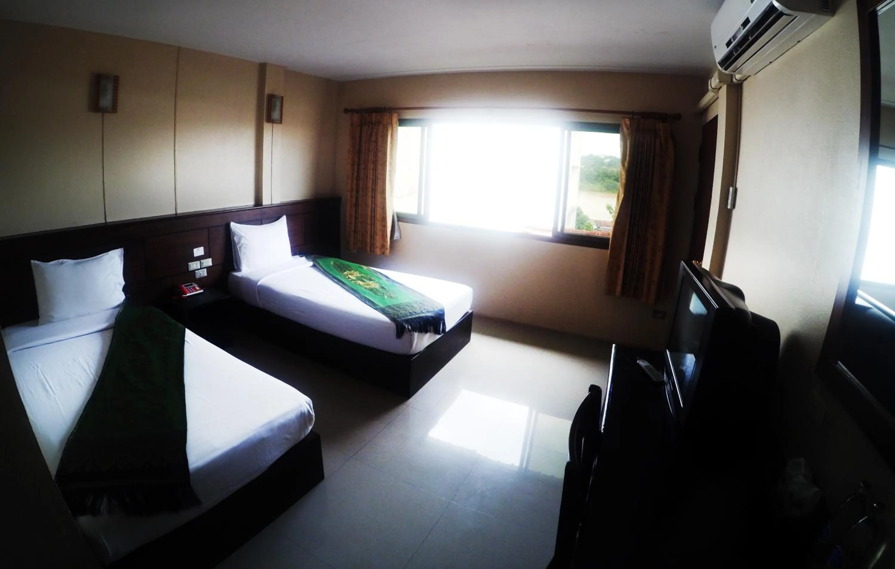 Bed in Chiangkhong Green Inn Resident