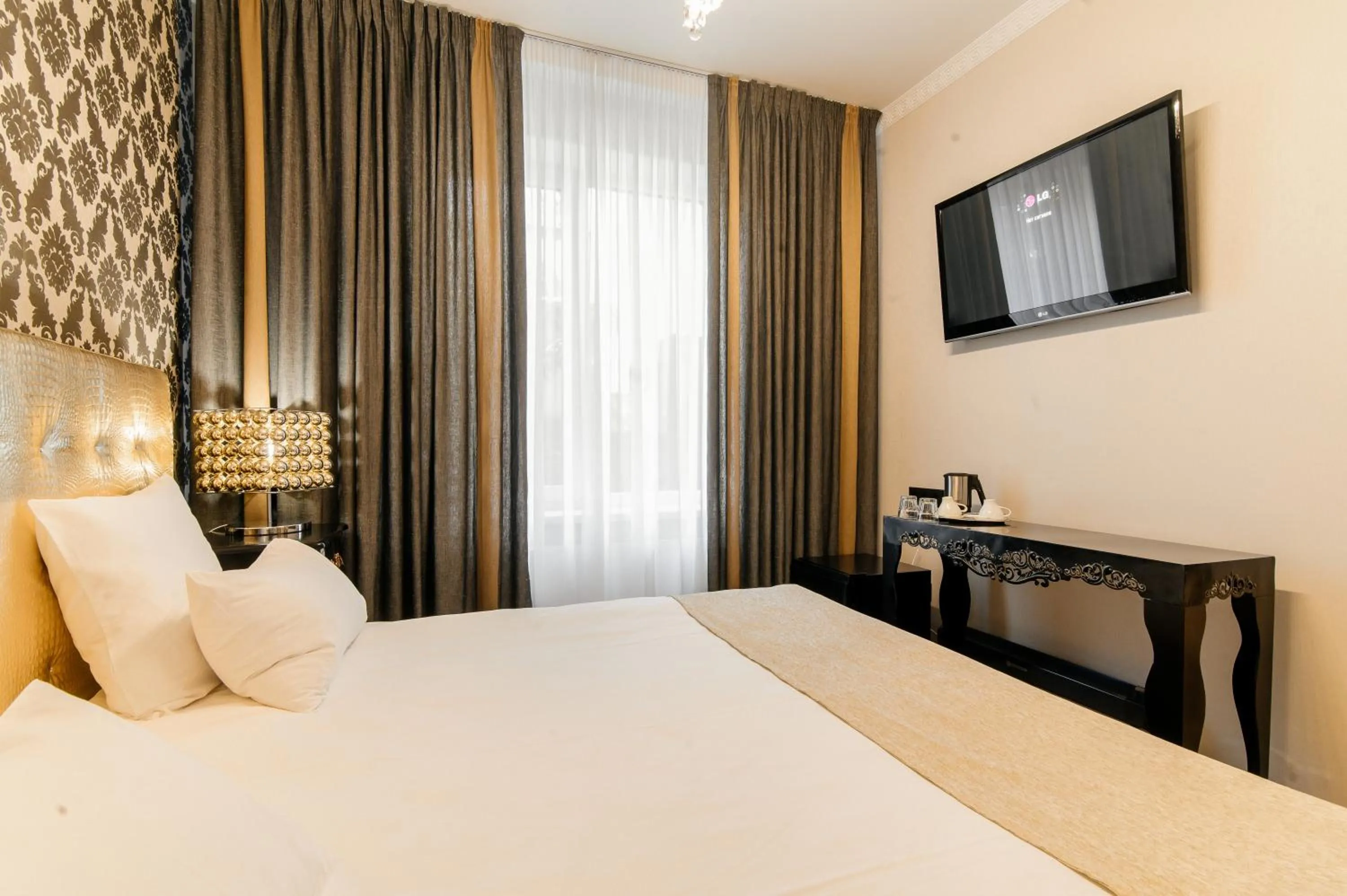 Bed in Weekend Boutique Hotel