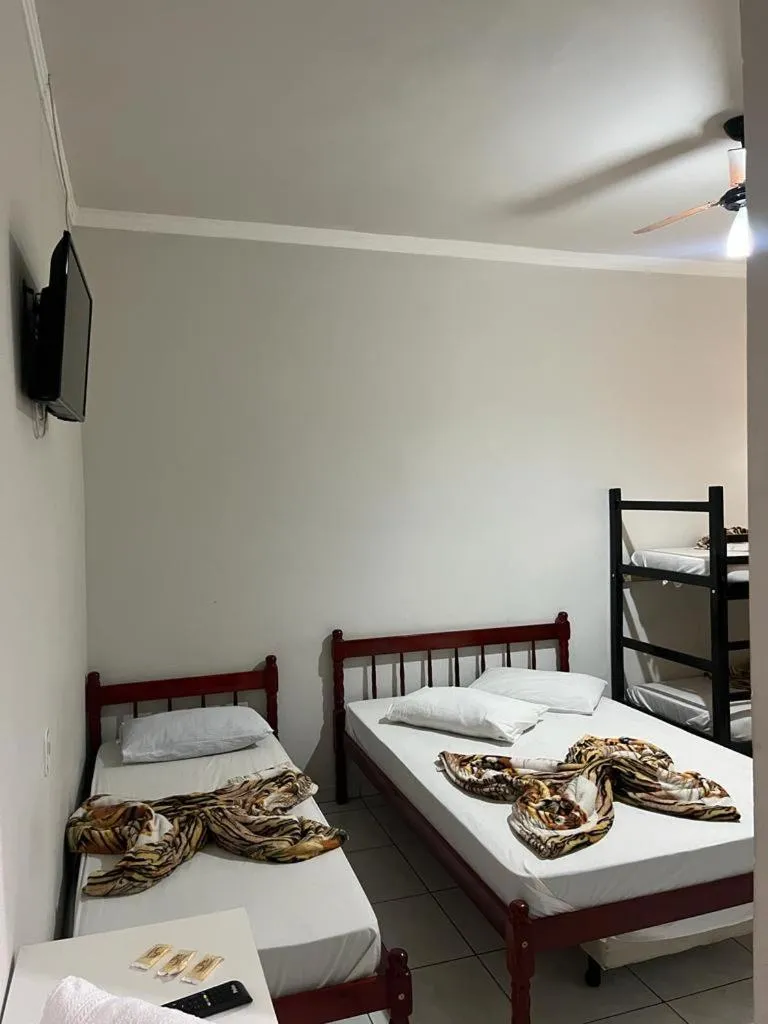 Bed in Hotel Romaria Aparecida