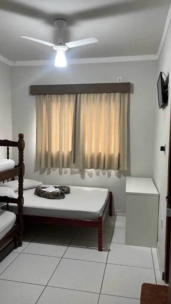 towels, Bed in Hotel Romaria Aparecida