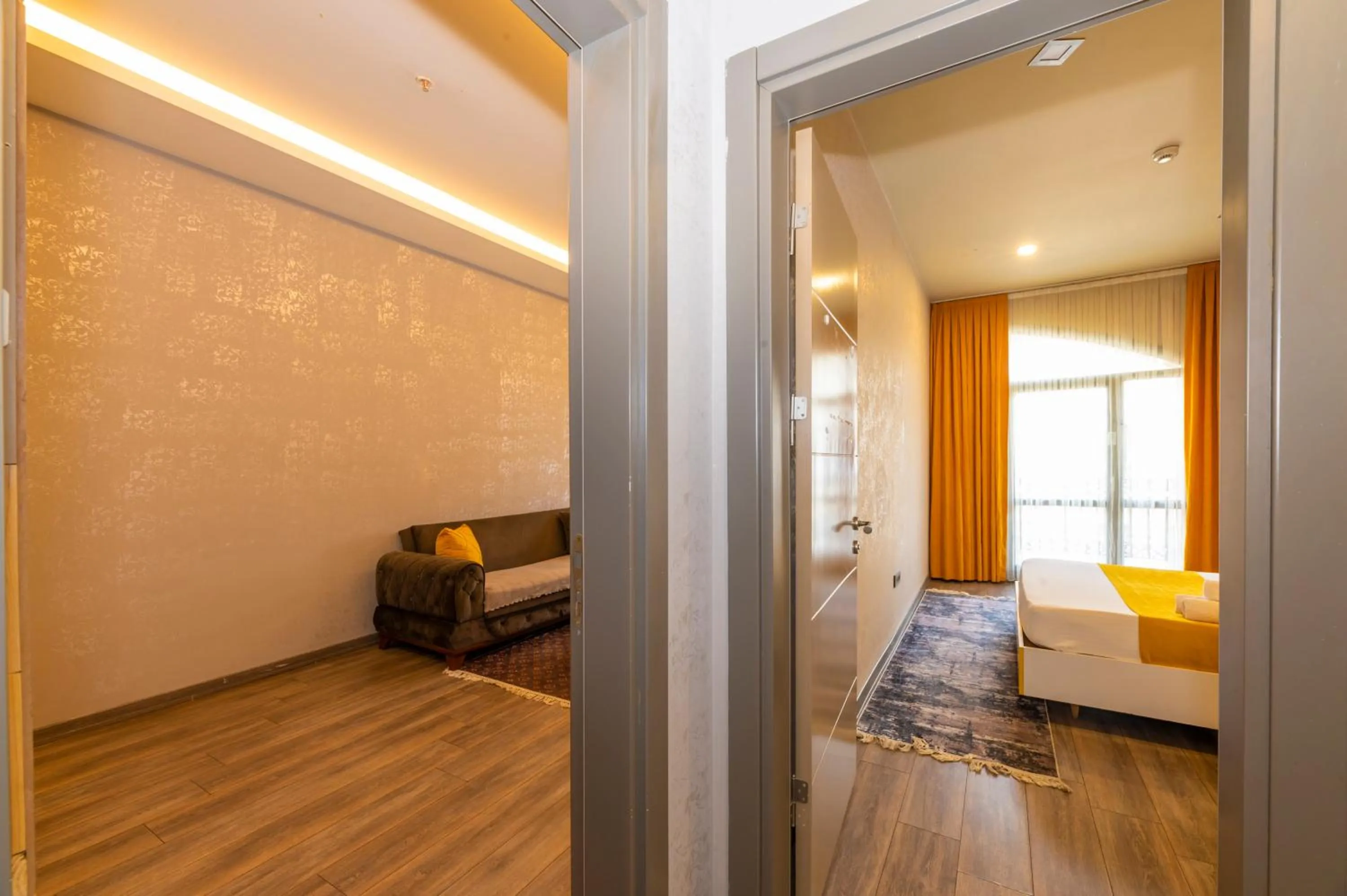 Living room, Bed in Agora Suites