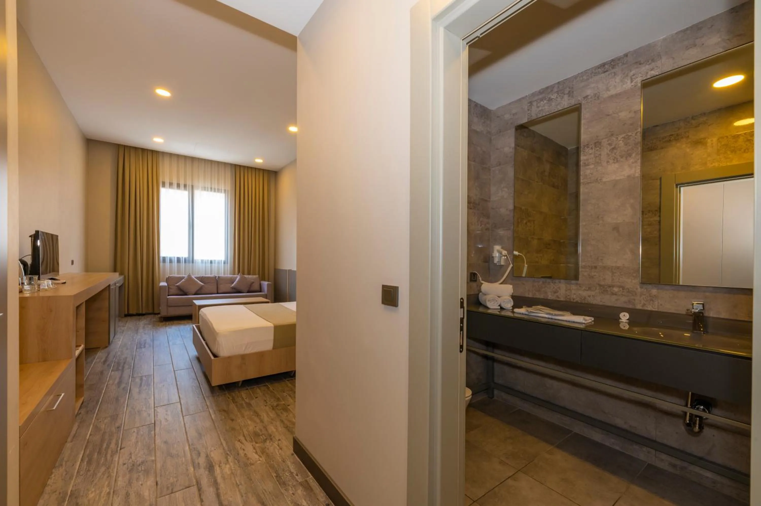 Bathroom, Bed in Agora Suites