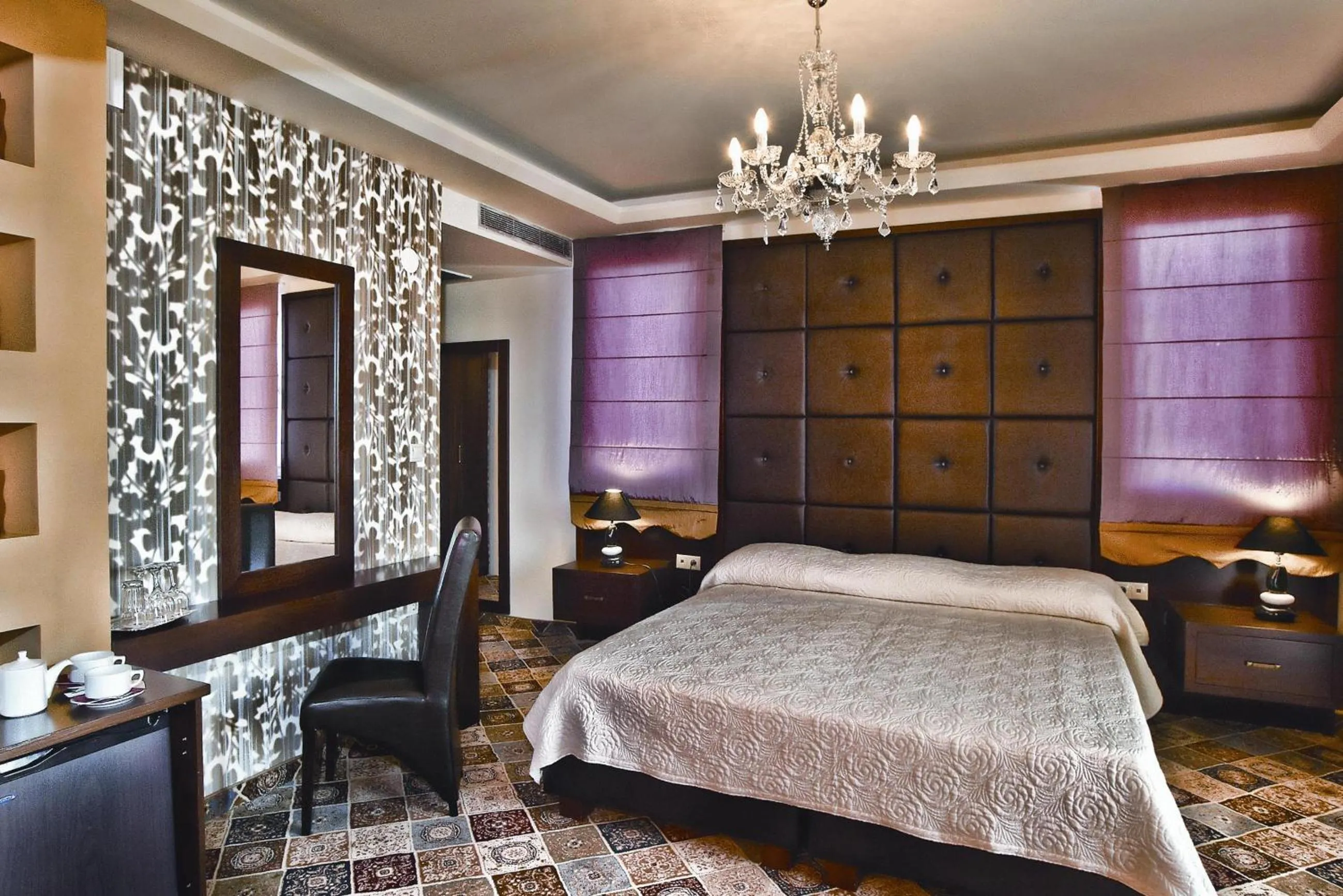 Bed in Phaidon Hotel & Spa