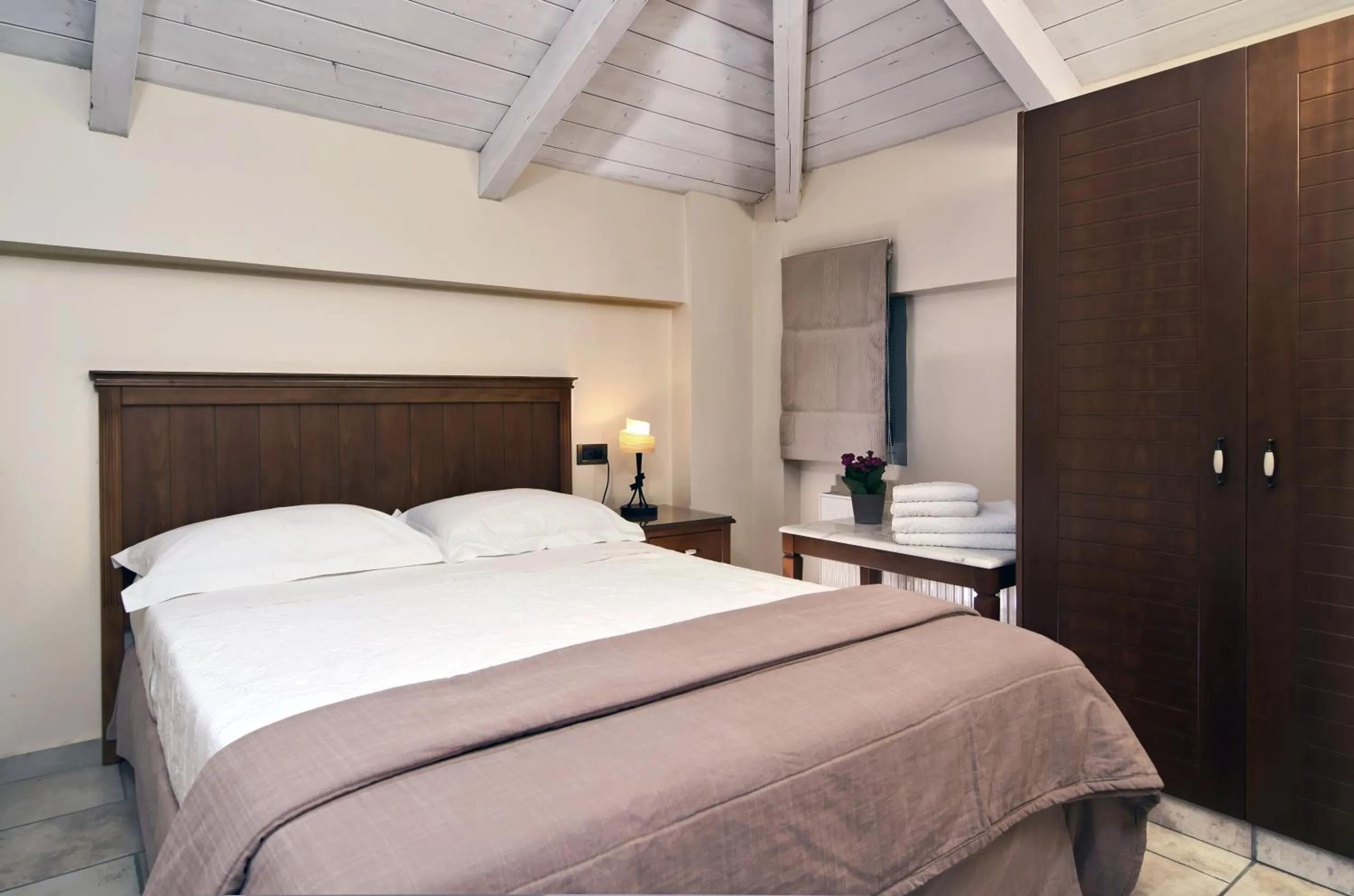 Bedroom, Bed in Harmony Hotel Apartments