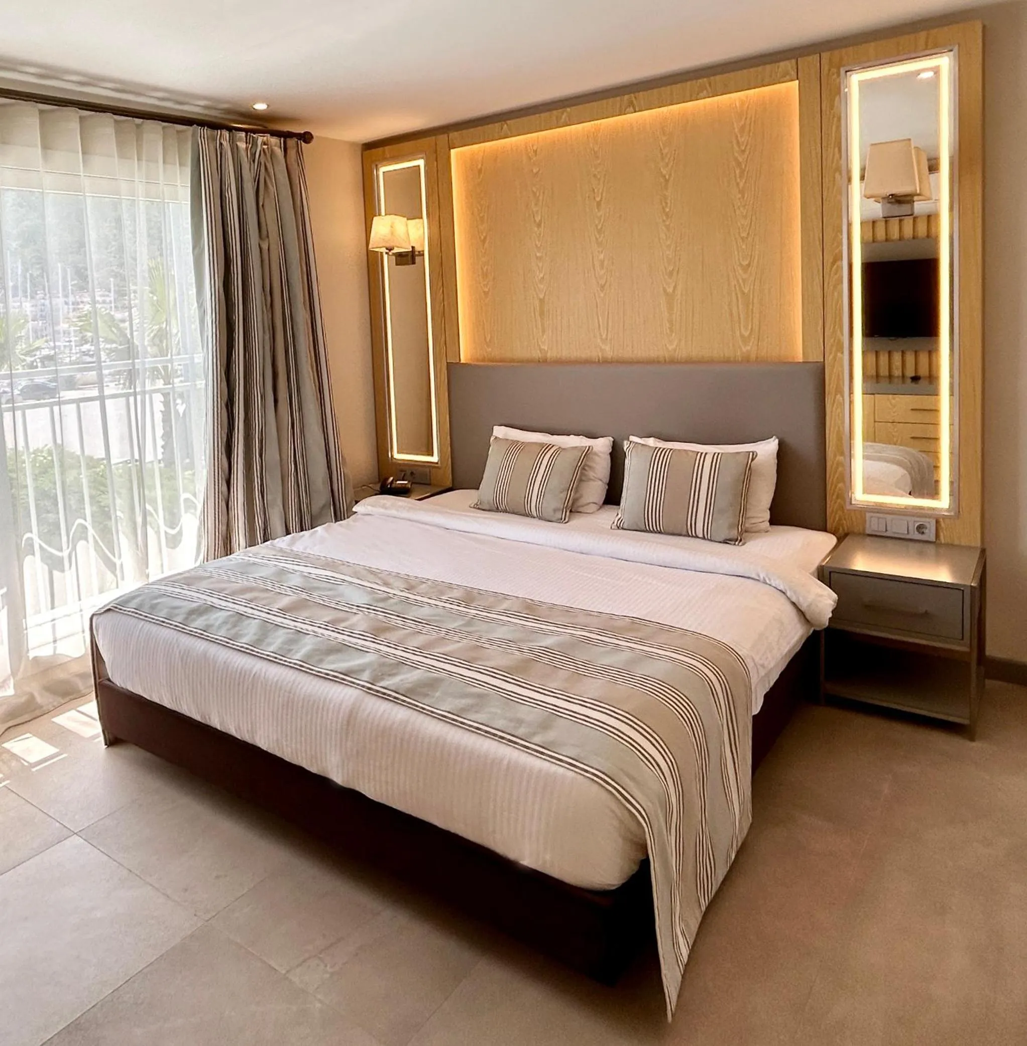 Bed in Marina Boutique Hotel