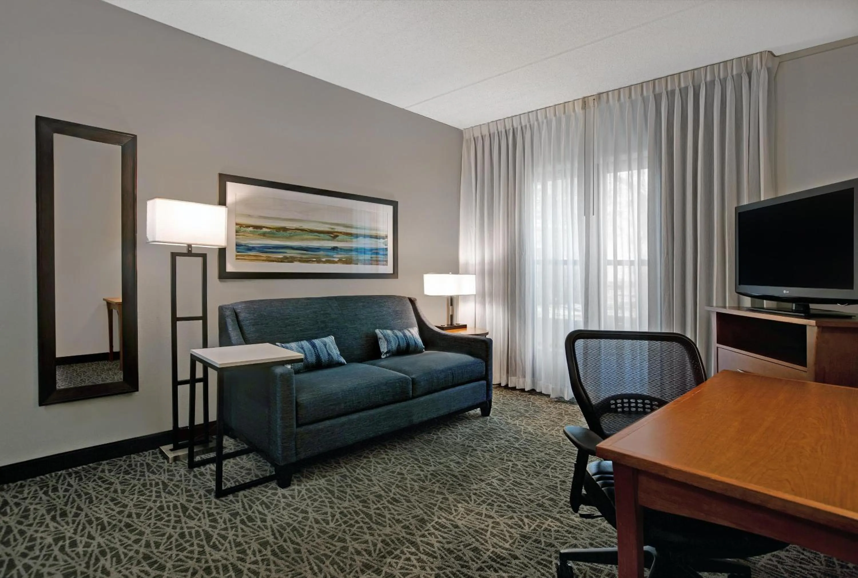 Living room in Homewood Suites by Hilton Chicago-Lincolnshire