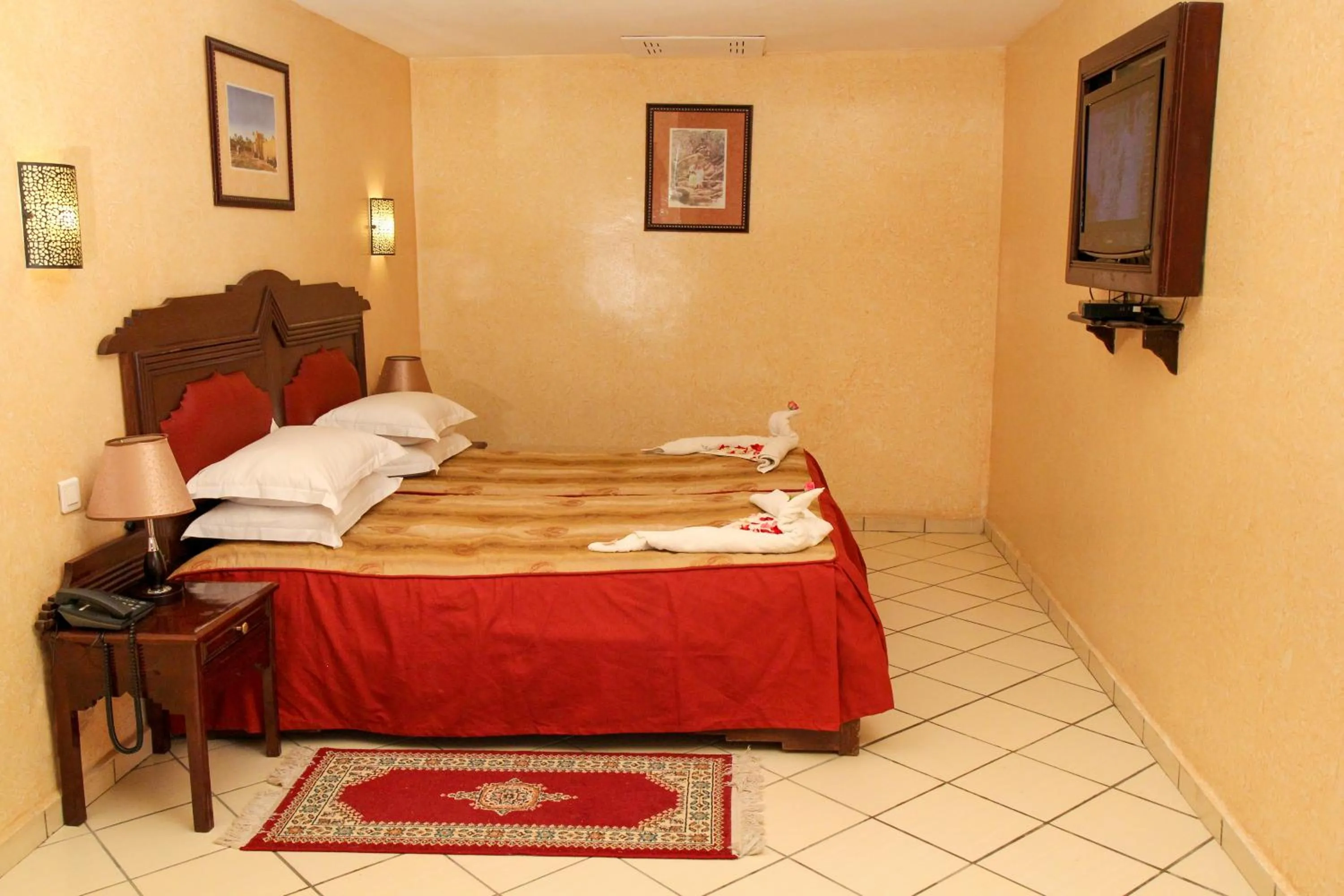Bedroom in New Farah Hotel