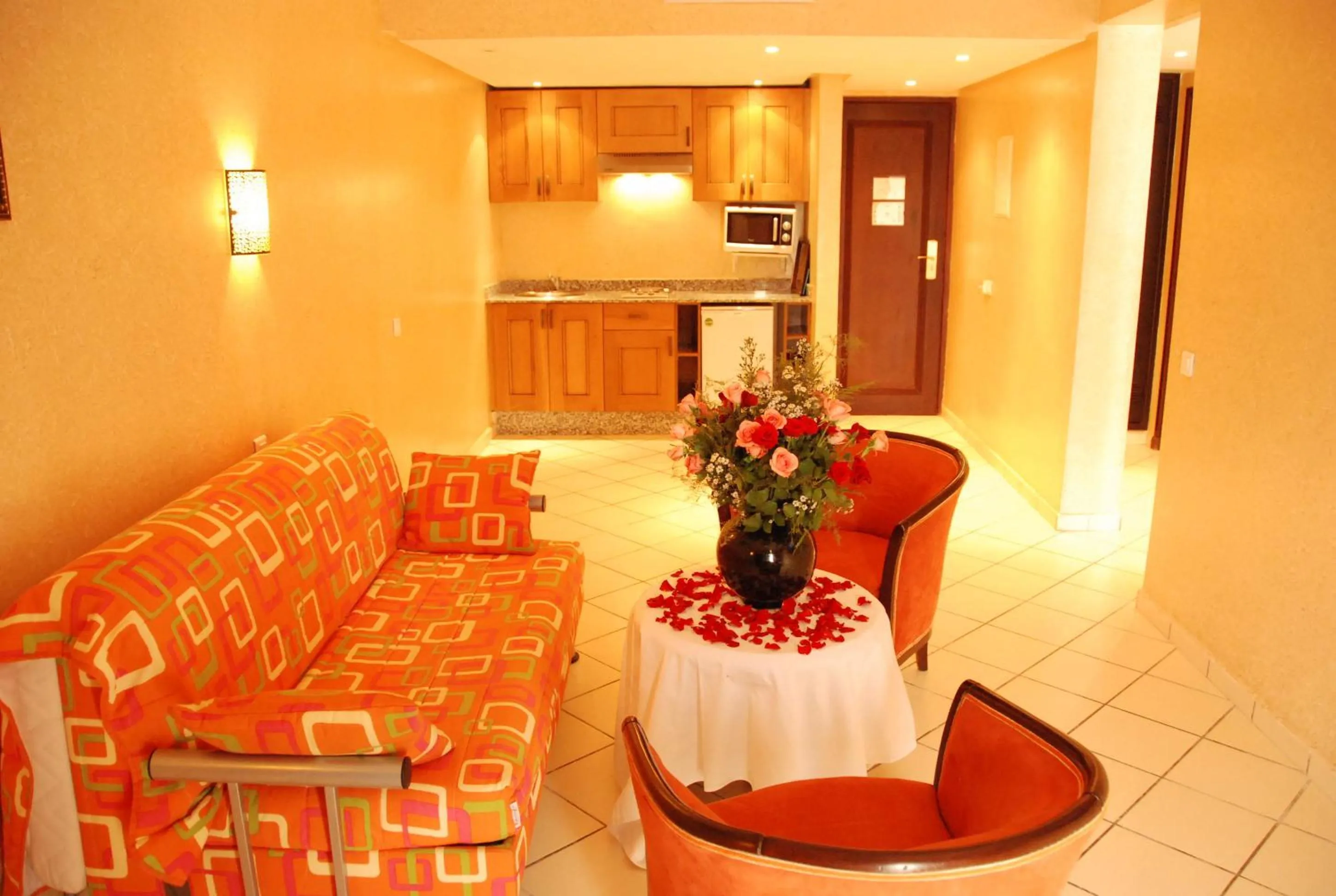 Kitchen or kitchenette in New Farah Hotel