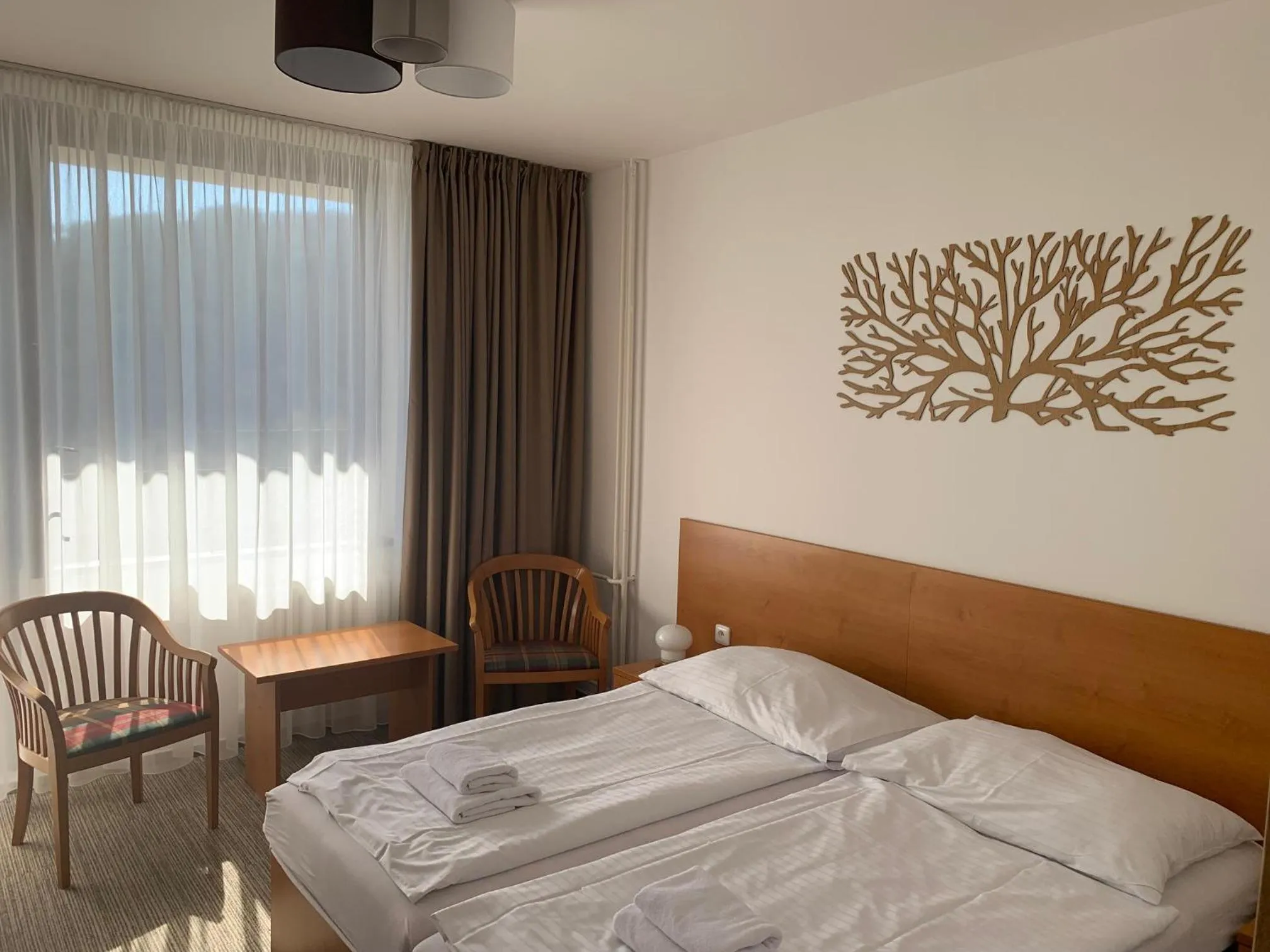 Bed in Hotel Adamantino