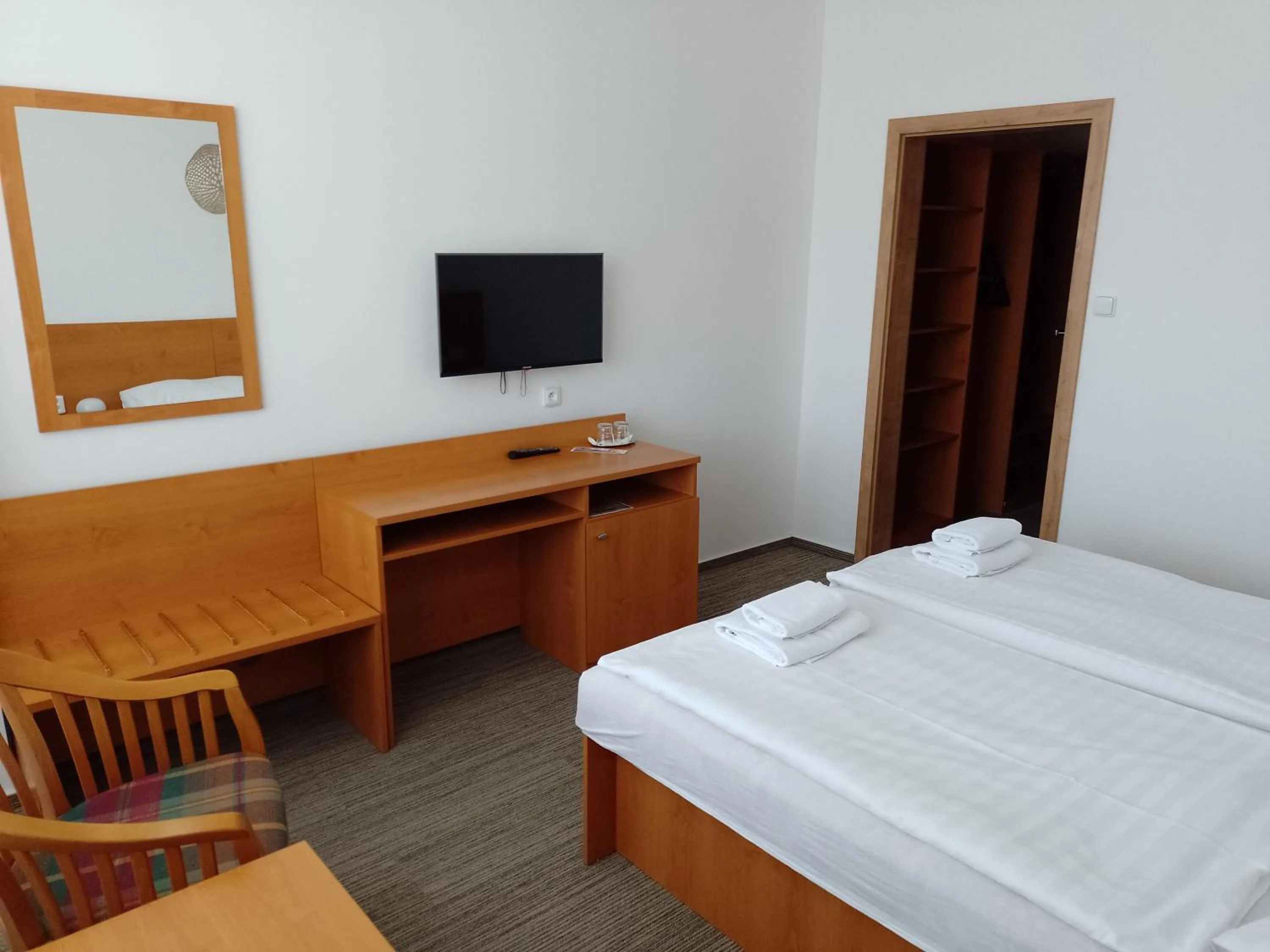 Bed in Hotel Adamantino