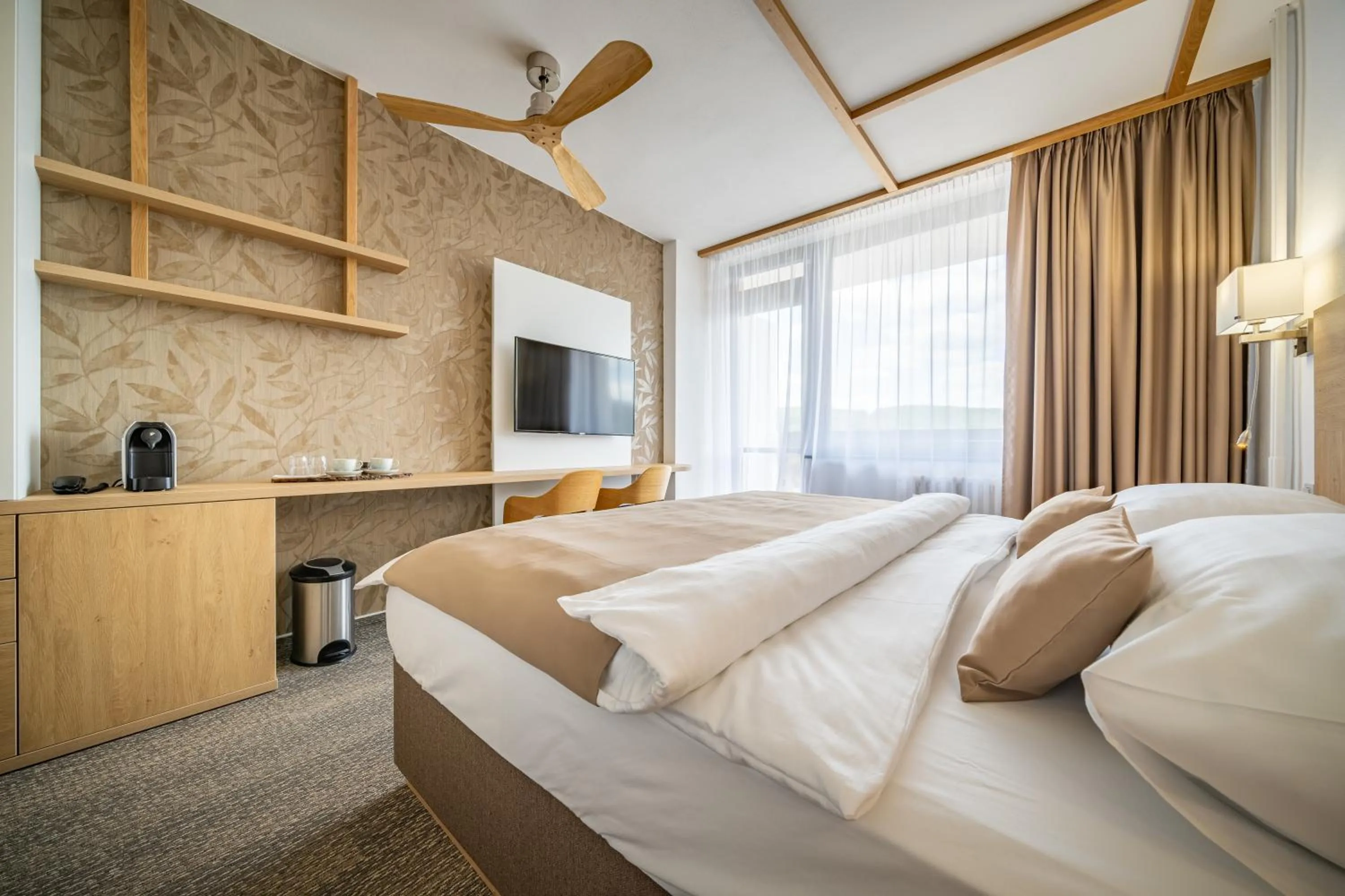 Bed in Hotel Adamantino