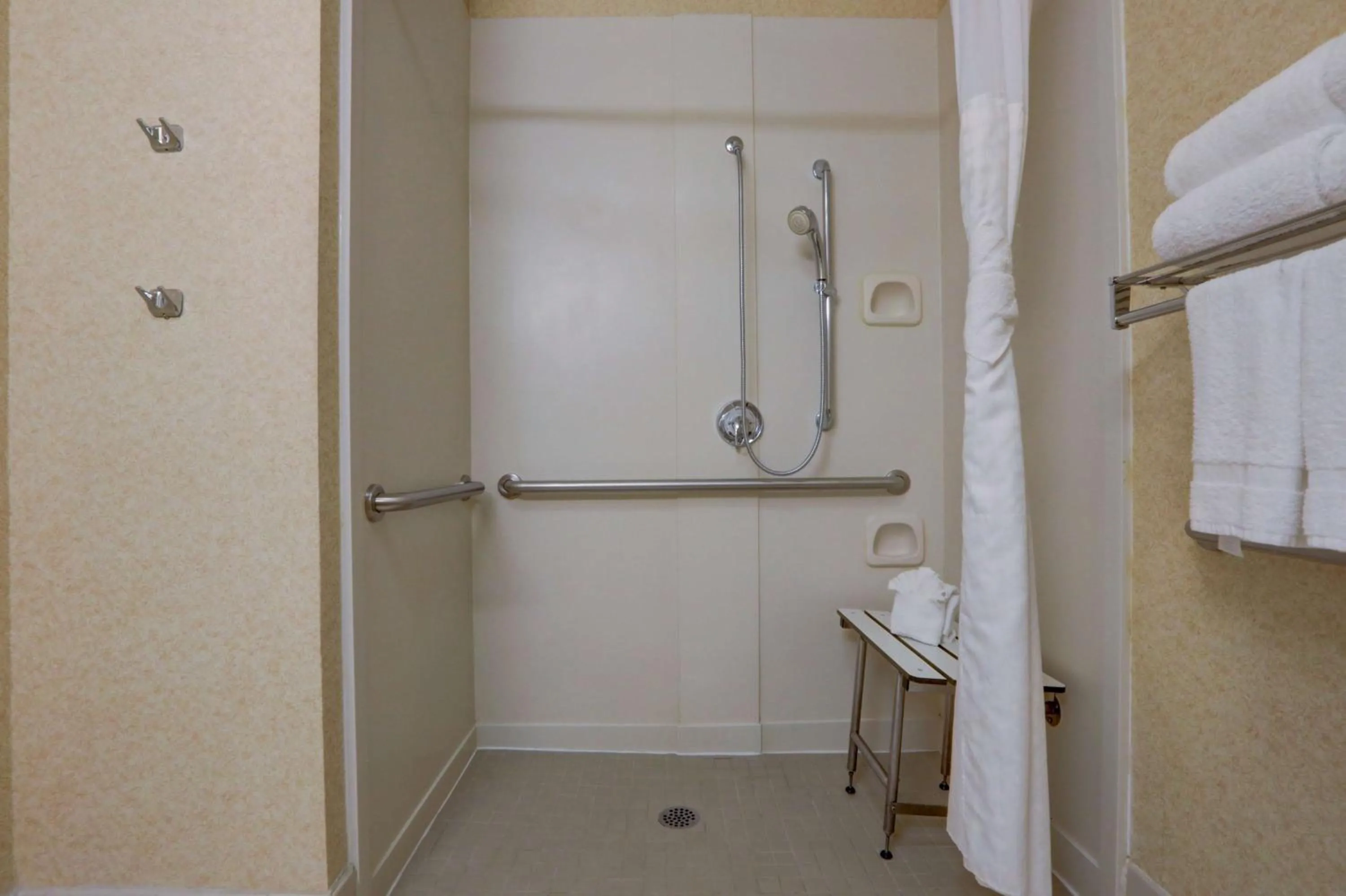 Bathroom in SureStay Plus Hotel by Best Western Chicago Lombard