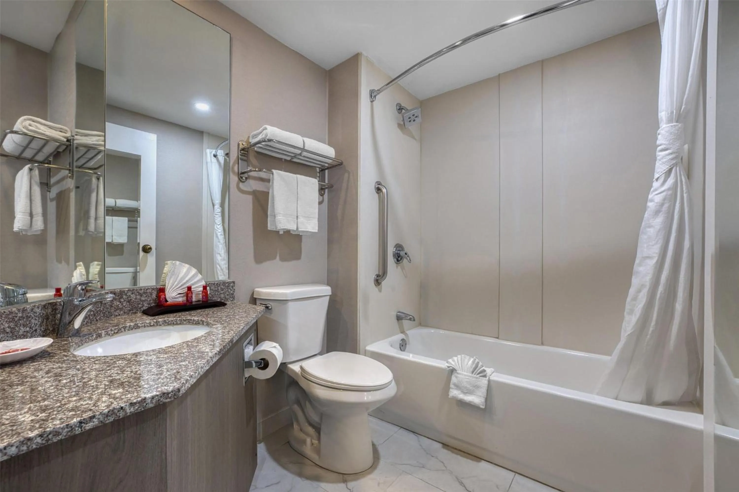 Bathroom in SureStay Plus Hotel by Best Western Chicago Lombard