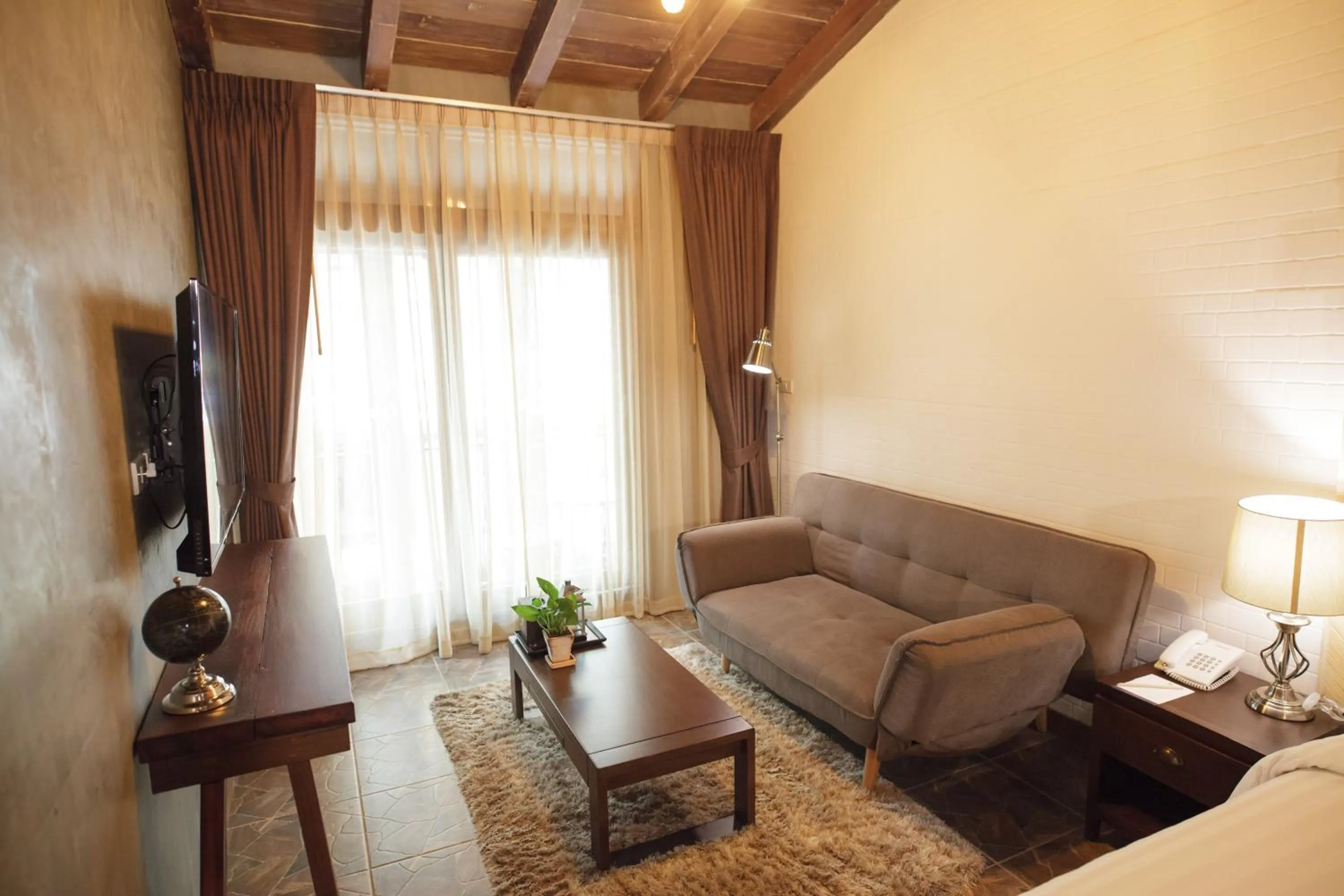 Living room in Sanae' Townhouse Chiang Mai