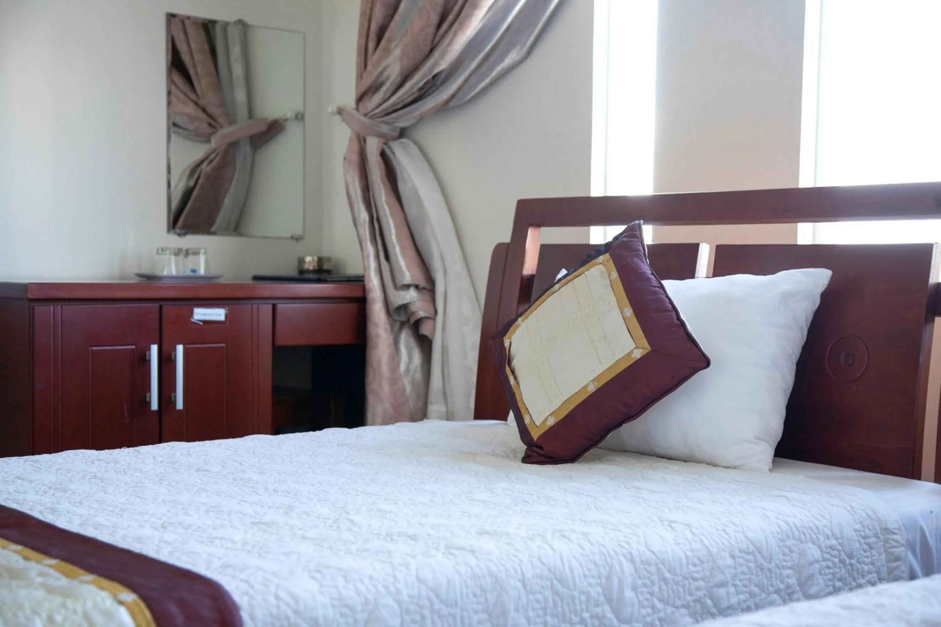 Bed in Hoang Thuy Sinh Hotel