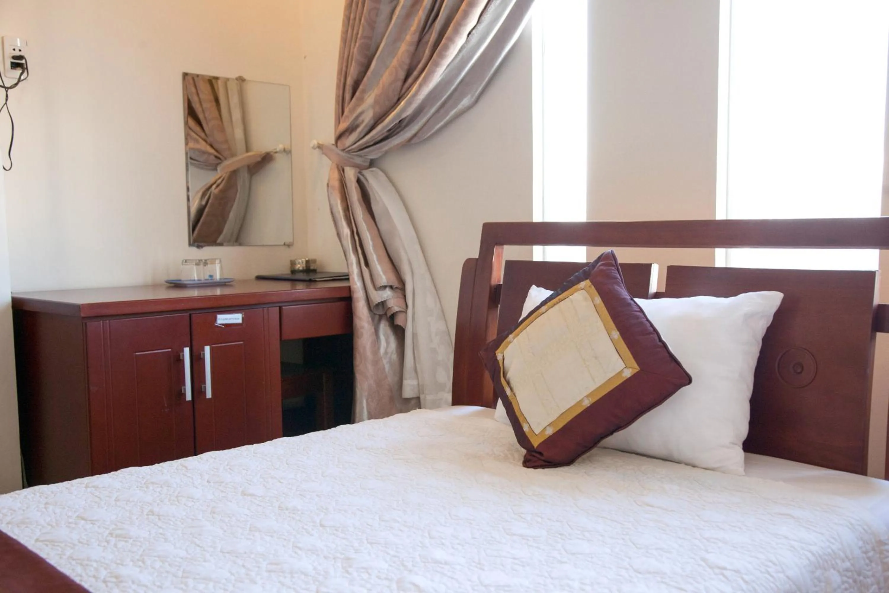 Bed in Hoang Thuy Sinh Hotel