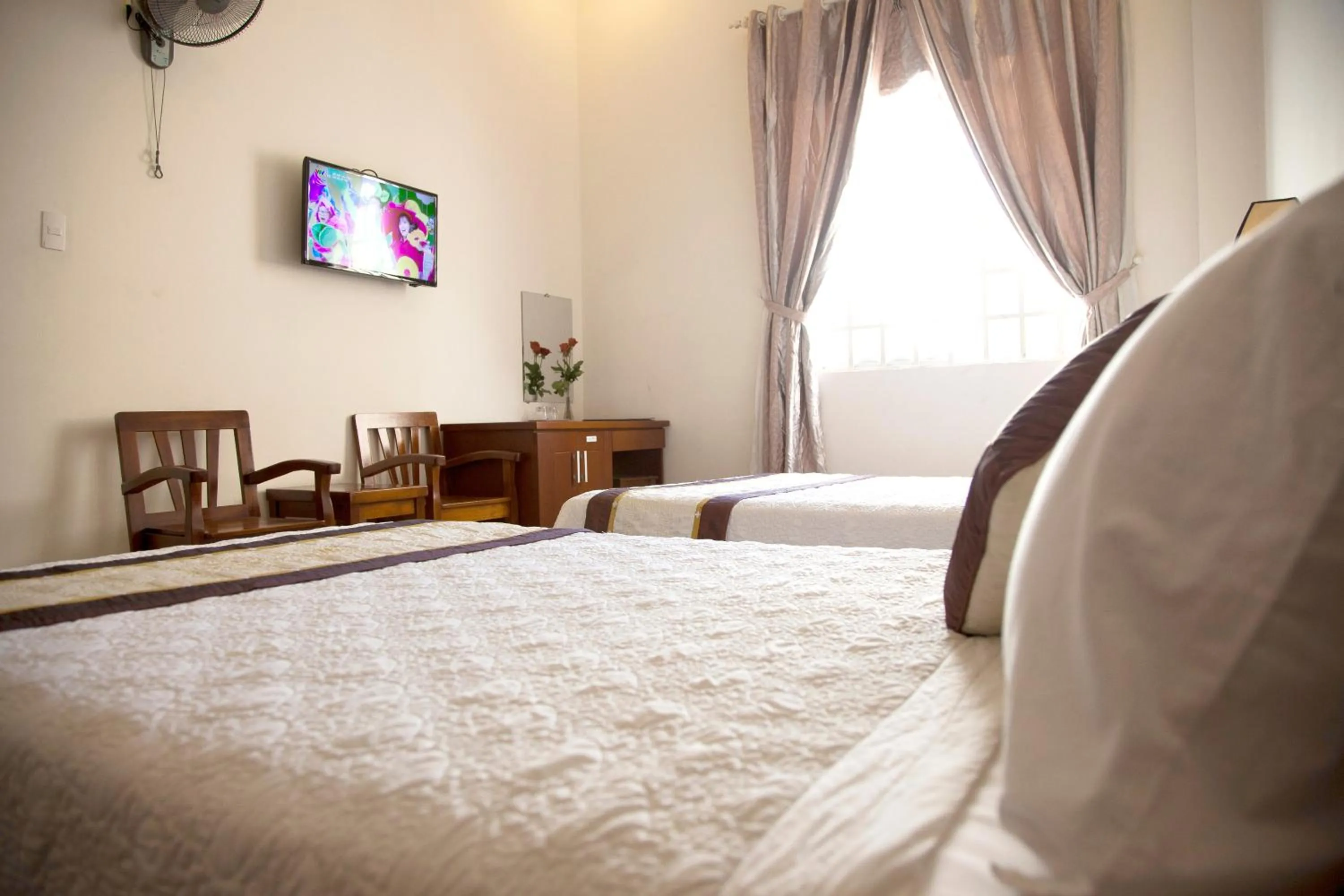 Bed in Hoang Thuy Sinh Hotel