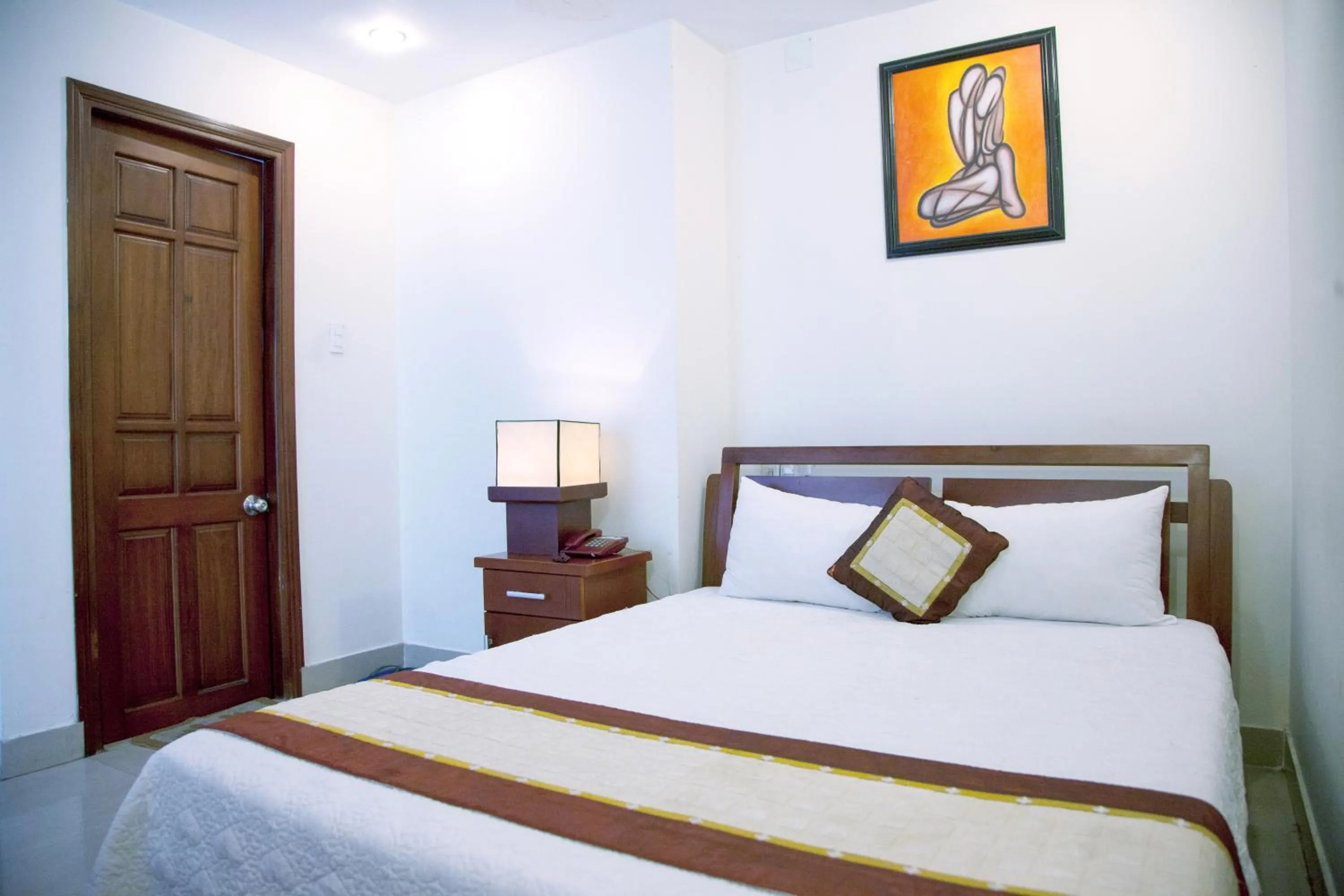 Bed in Hoang Thuy Sinh Hotel