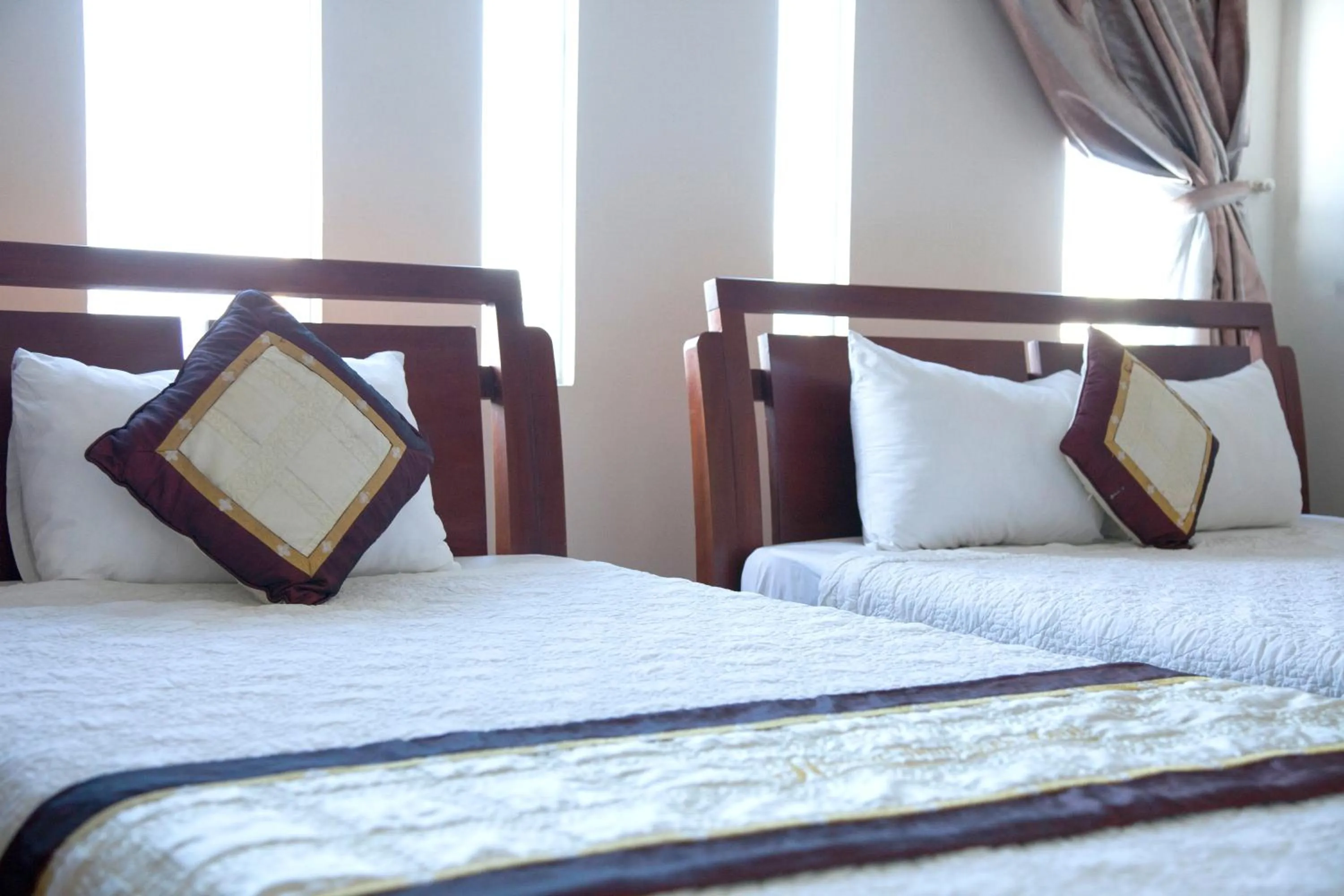 Bed in Hoang Thuy Sinh Hotel