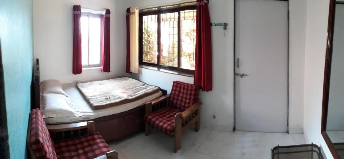 Bed in Om Datta Krupa Niwas Cottage