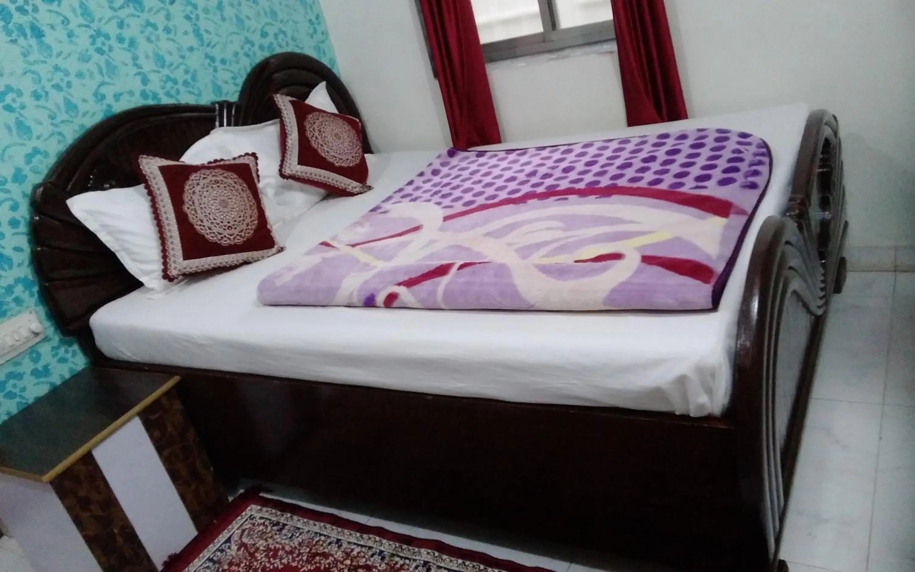 Bed in Om Datta Krupa Niwas Cottage