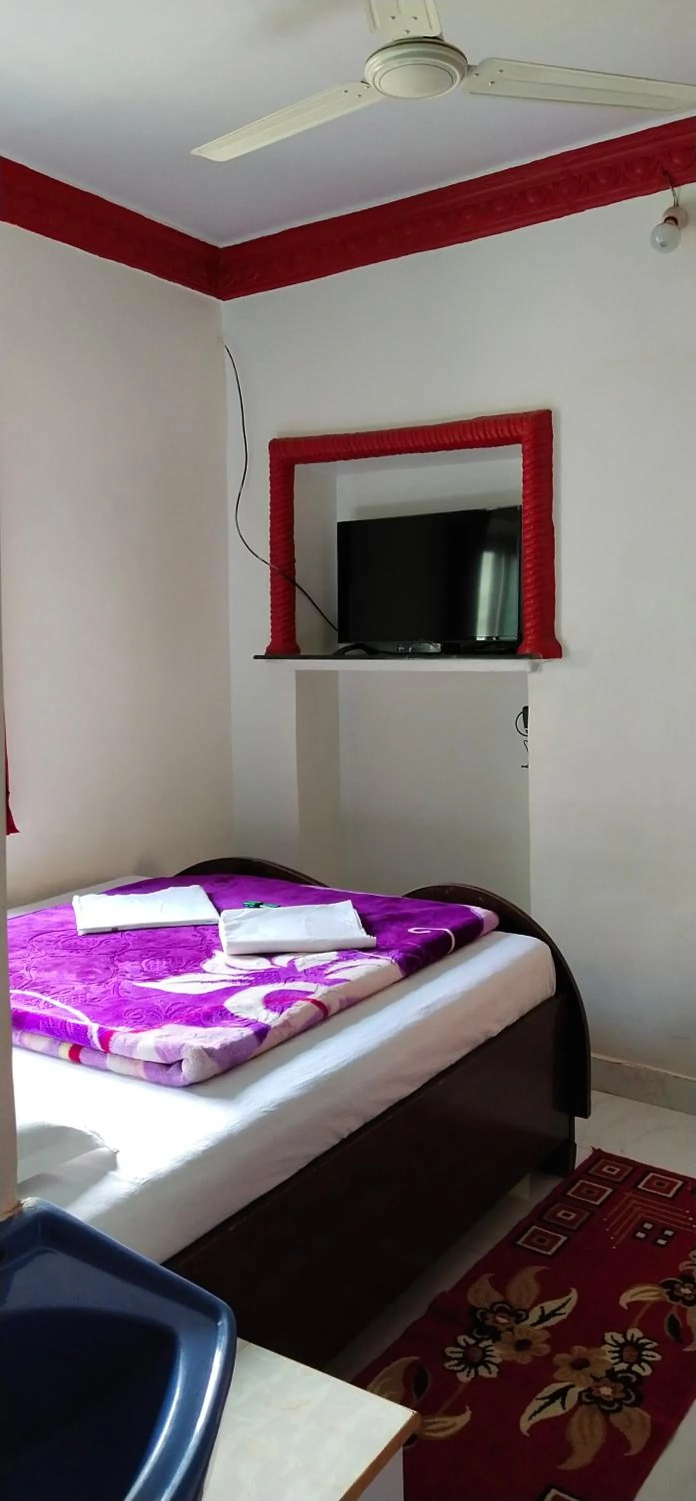 Bed in Om Datta Krupa Niwas Cottage