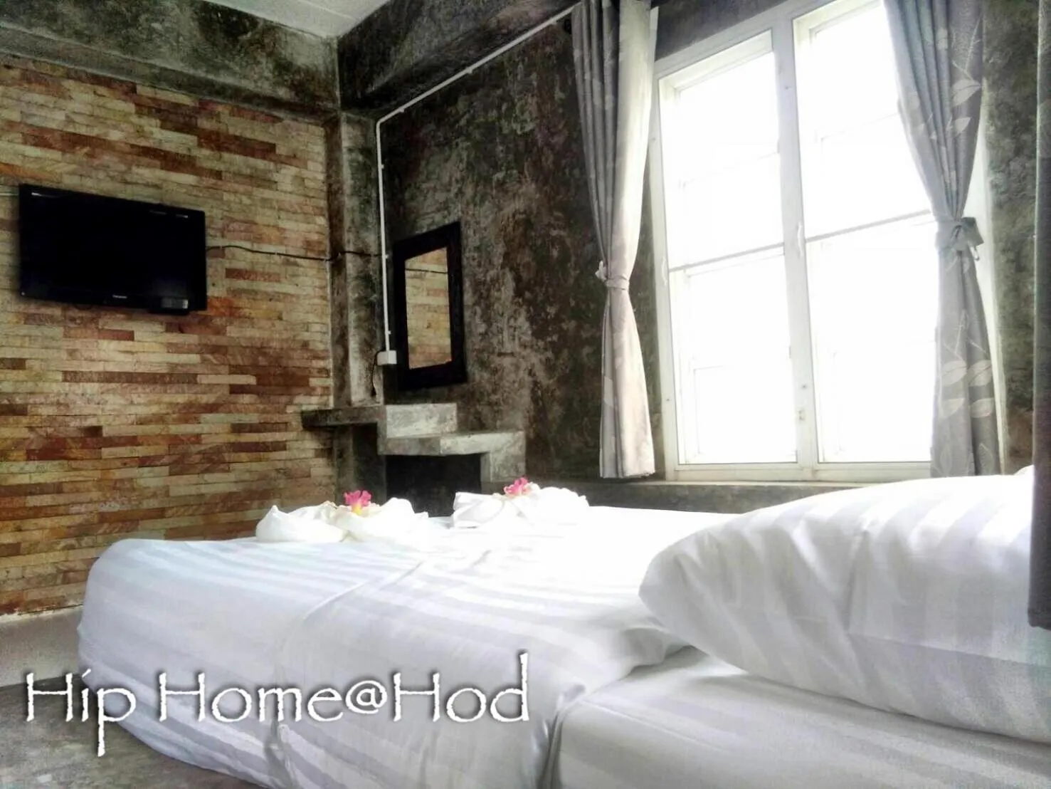 Bed in Hip Home at Hod